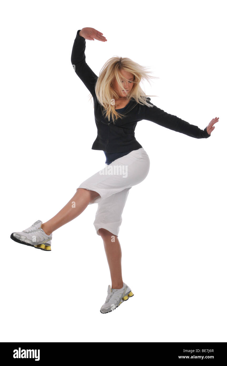 Young modern hip hop dancer performing against a white background Stock ...