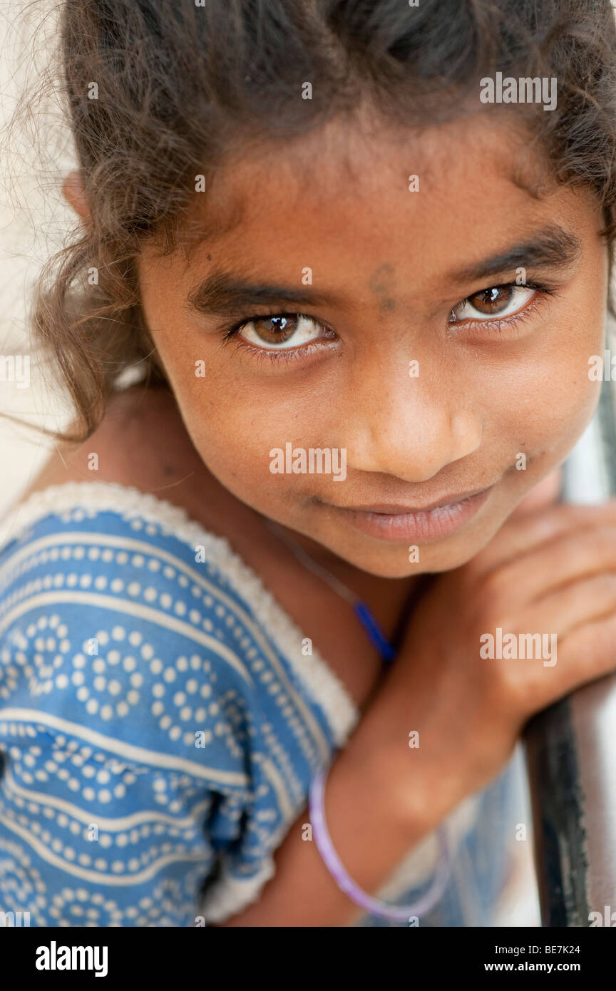 Pretty lower caste indian beggar girl looking up. Andhra Pradesh, India. Selective focus Stock Photo