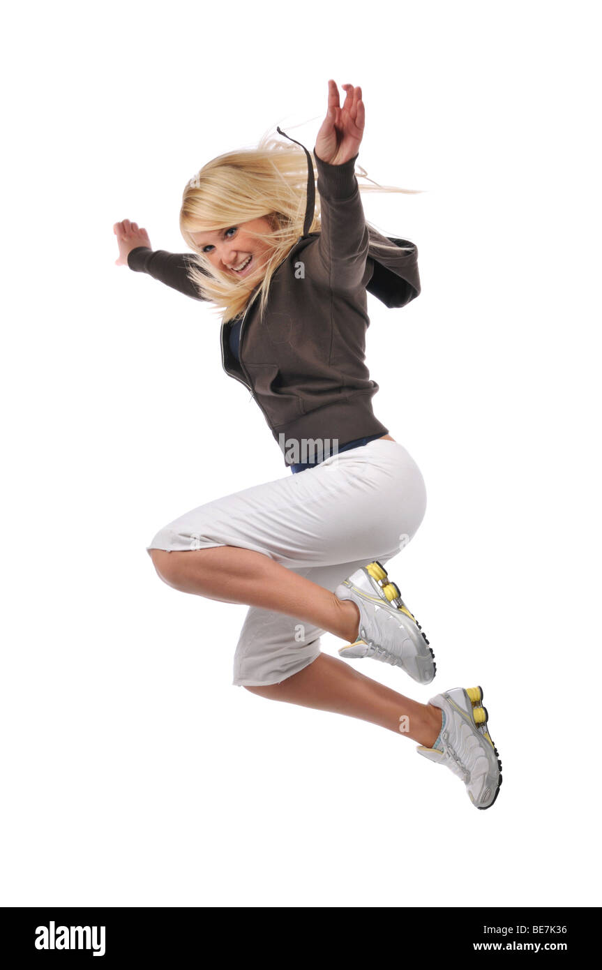 Young modern hip hop dancer performing against a white background Stock ...