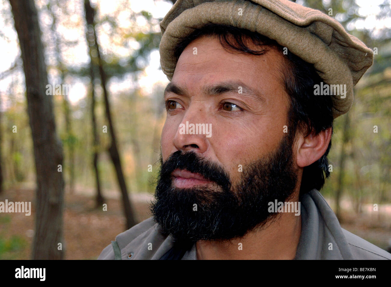 Portrait of a middle aged Pashtun Afghan man with a beard and wearing a wool pakol hat from the village of Istalif, north of Kabul, Afghanistan. Stock Photo