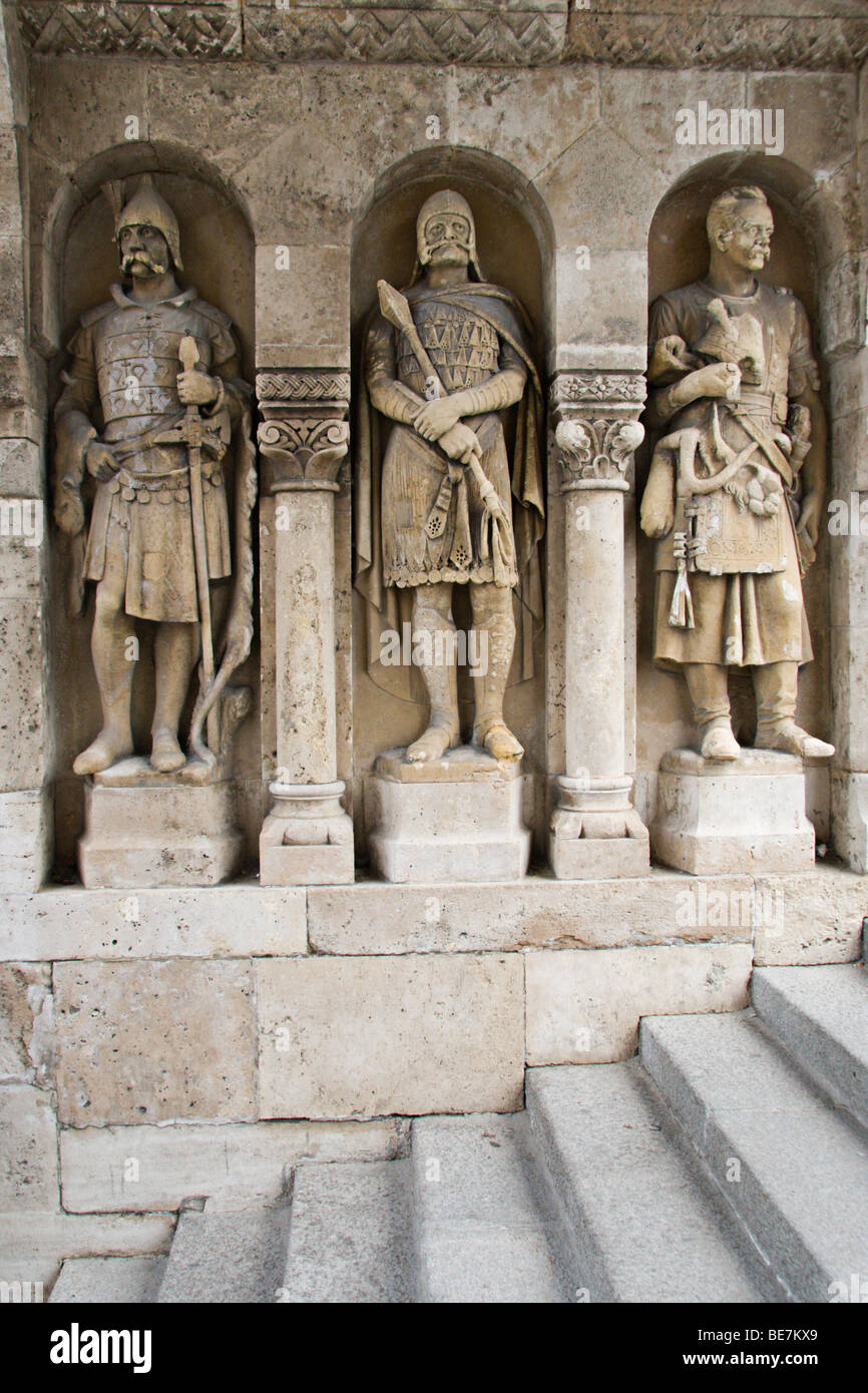 Statues guard rthe steps leading down from the Fishermen's Bastion, a famous monument in the old Buda area of Budapest Stock Photo