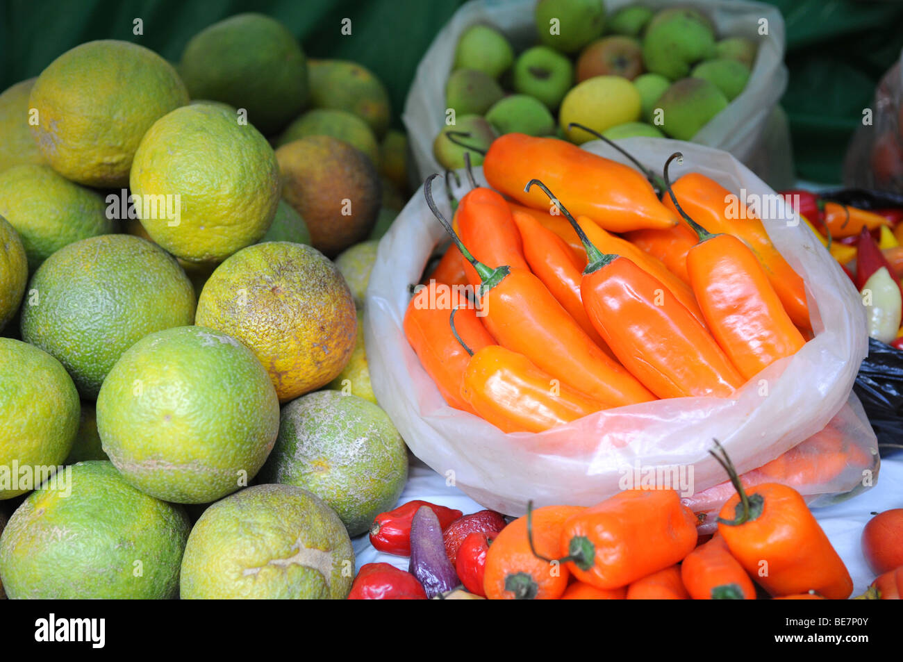 Fresh produce of lemons and chili peppers at local market in Northern Peru Stock Photo