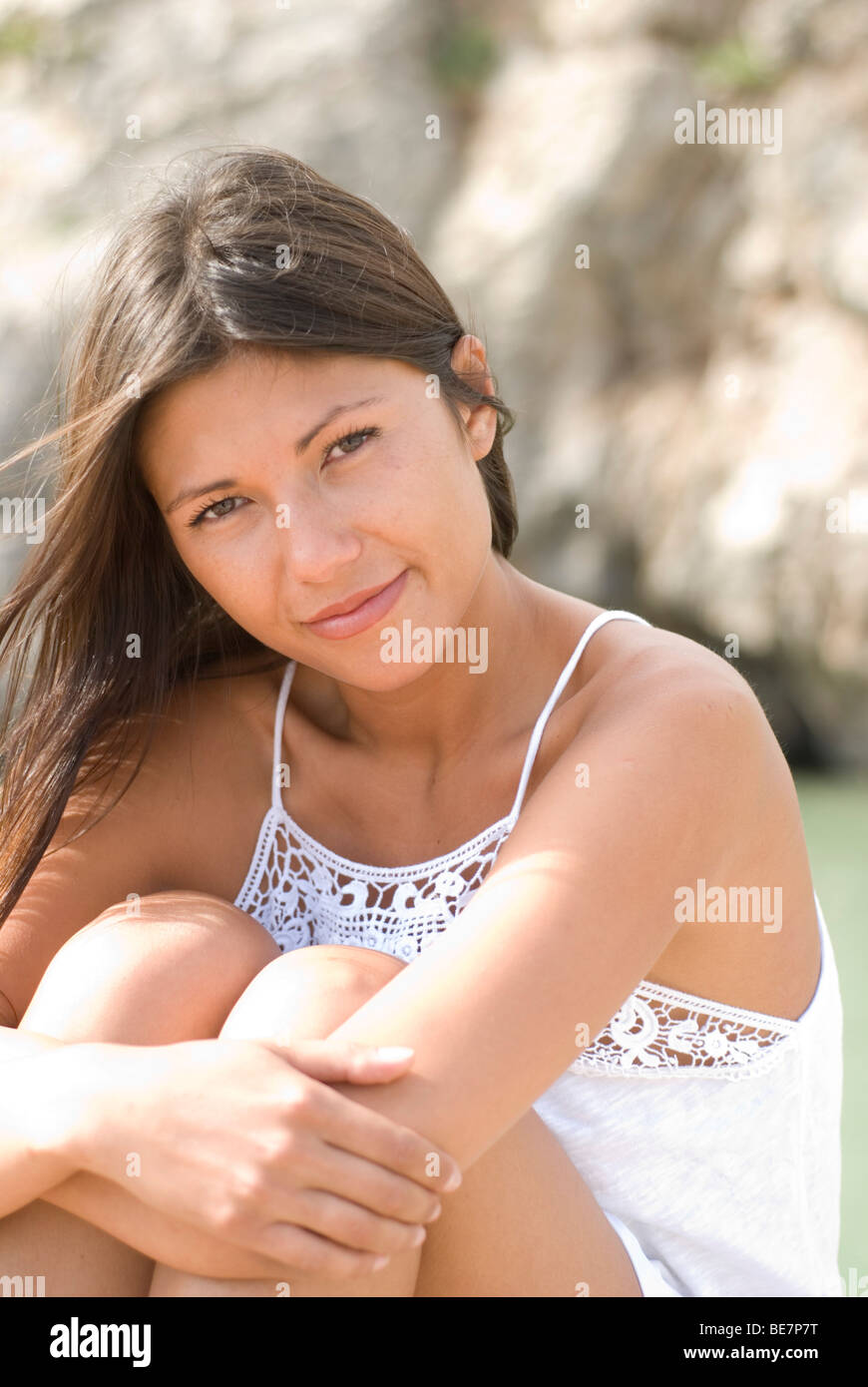 Young woman posing outside hi-res stock photography and images - Alamy