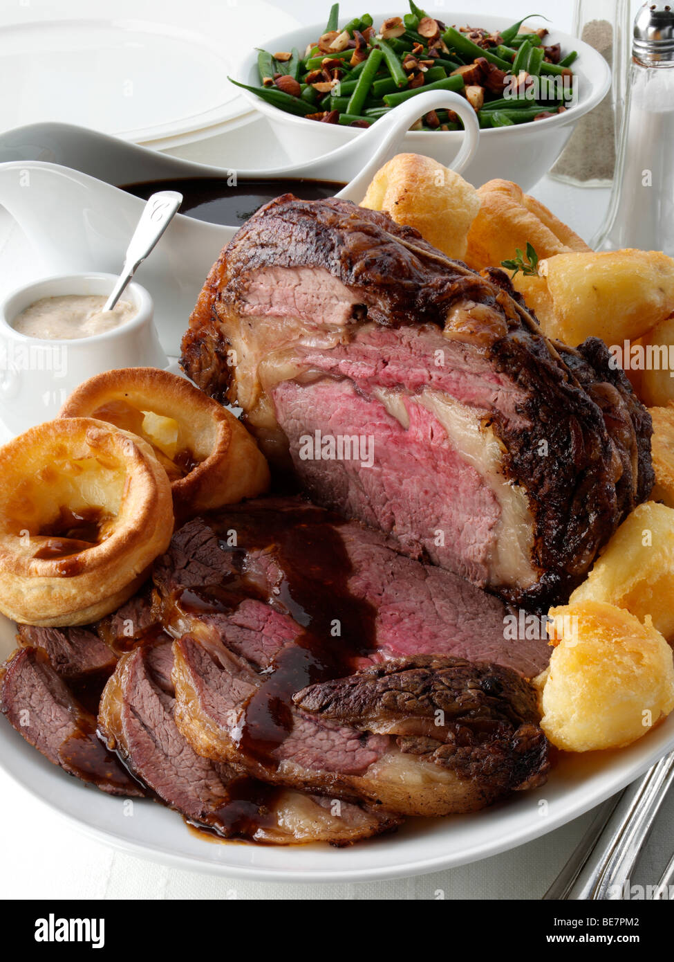 Boned roast rib of beef table setting Stock Photo - Alamy