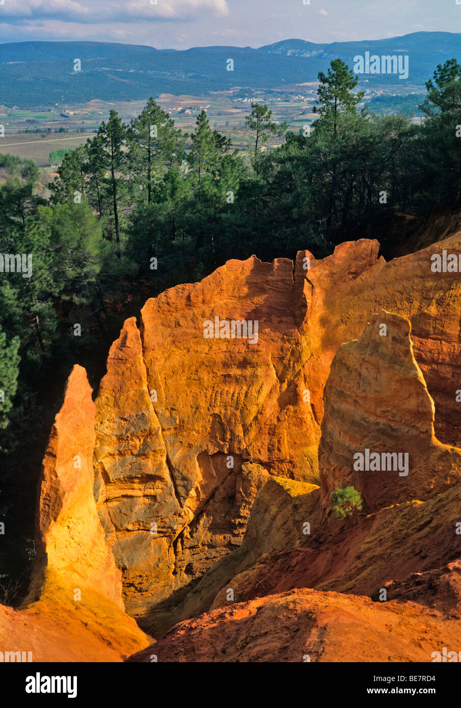 Orche Rocks Image The weathered ochre rocks in the hillside village of Roussillon in ...