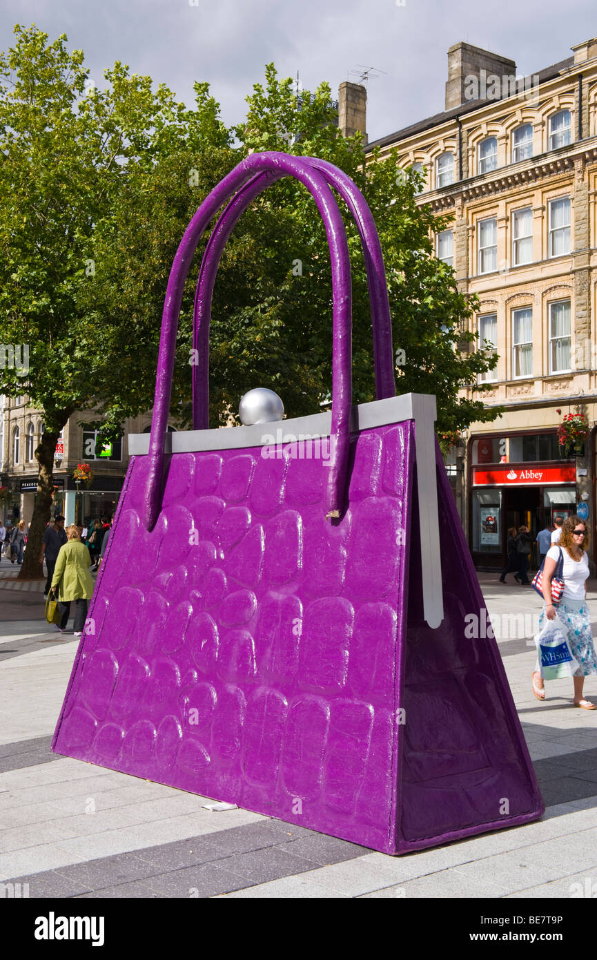 Giant handbag in shopping street to promote opening of new John Lewis store in Cardiff South Wales UK Stock Photo Alamy