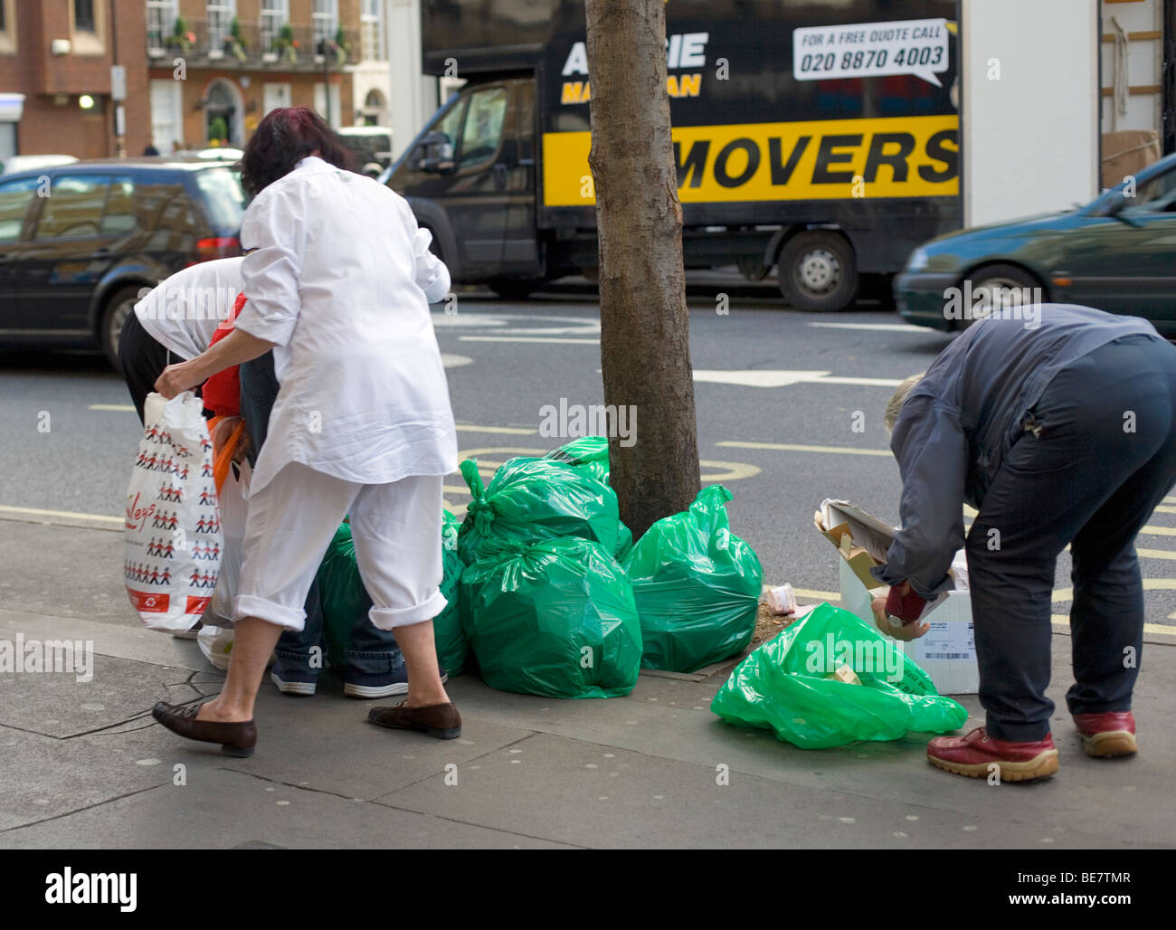 End of day discarded food grab, Baker Street, London, England, UK, Europe Stock Photo