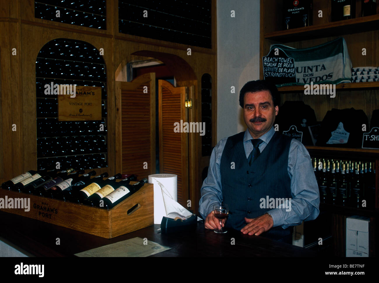 Portuguese man, server, tasting room, Graham's port house, Vila Nova de Gai,a Porto District, Portugal, Europe Stock Photo