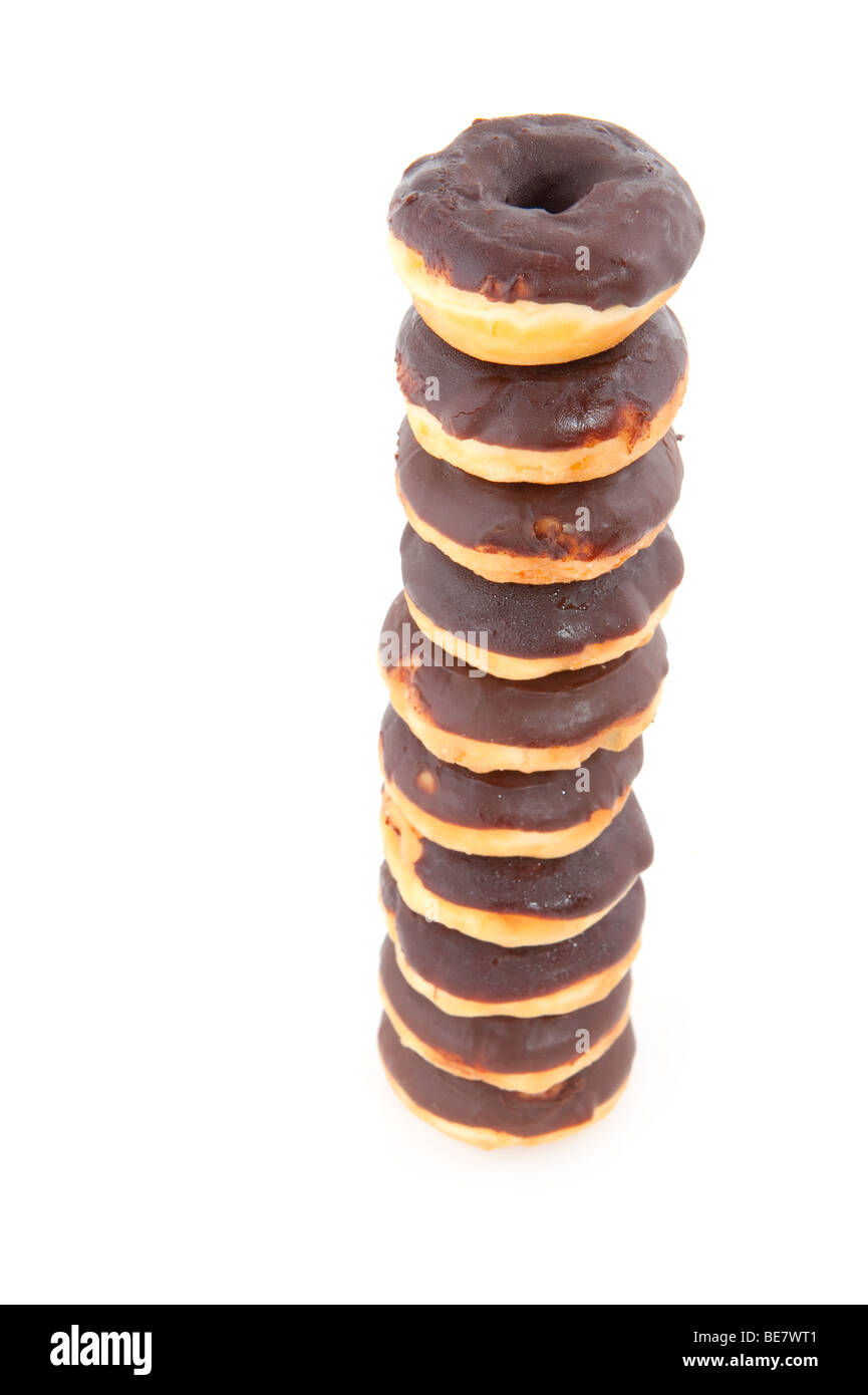 Many stacked tasty chocolate donuts isolated over white Stock Photo Alamy