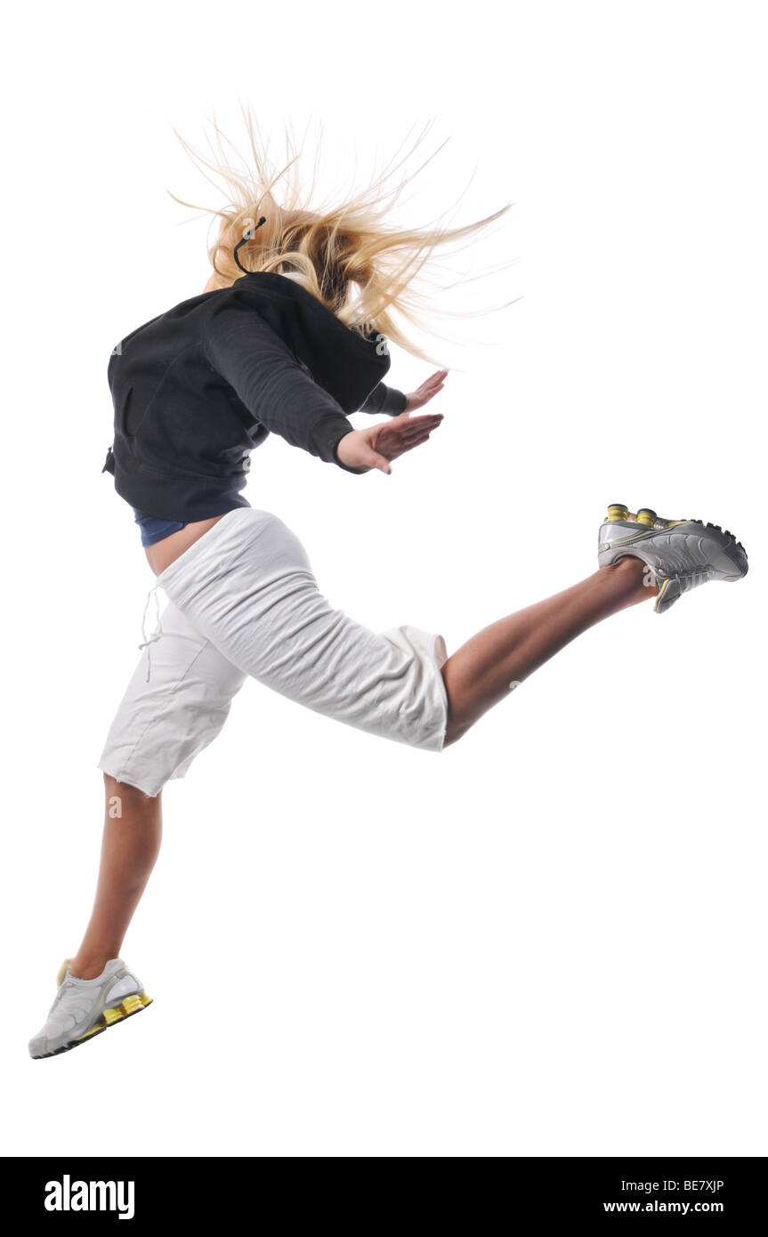Young modern hip hop dancer performing against a white background Stock ...