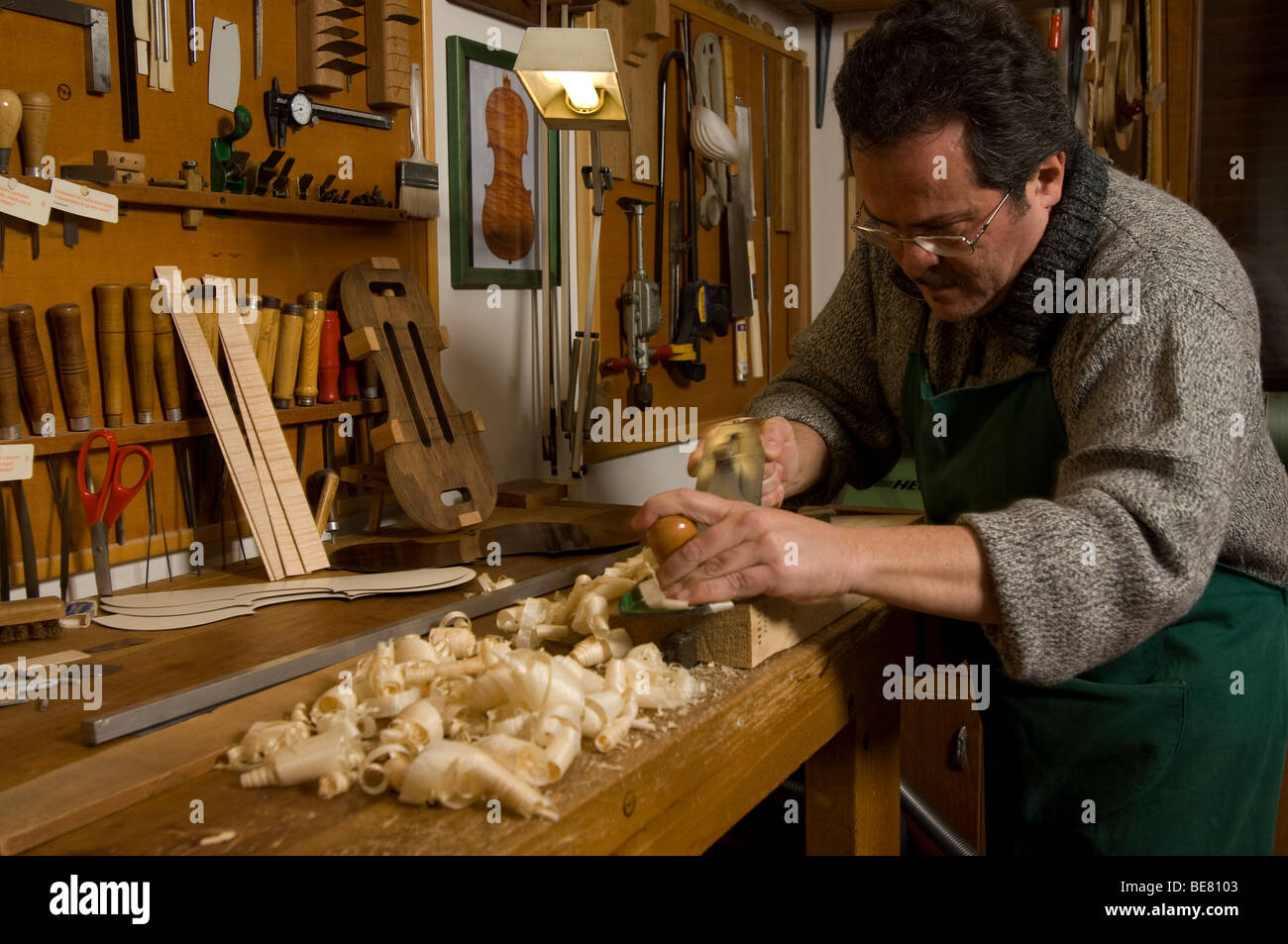 Primo Pistono making a violin in his workshop, Violin Maker, Cremona, Lombardy, Italy Stock Photo