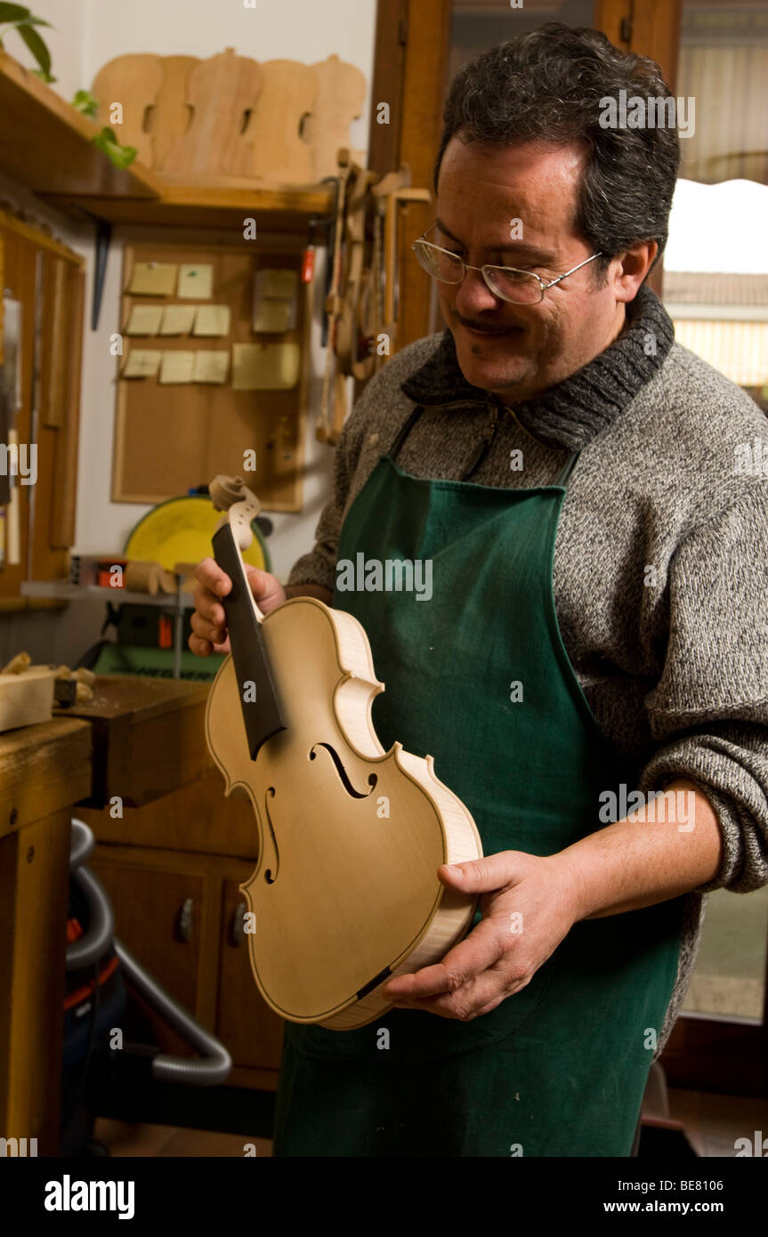 Primo Pistono making a violin in his workshop, Violin Maker, Cremona, Lombardy, Italy Stock Photo