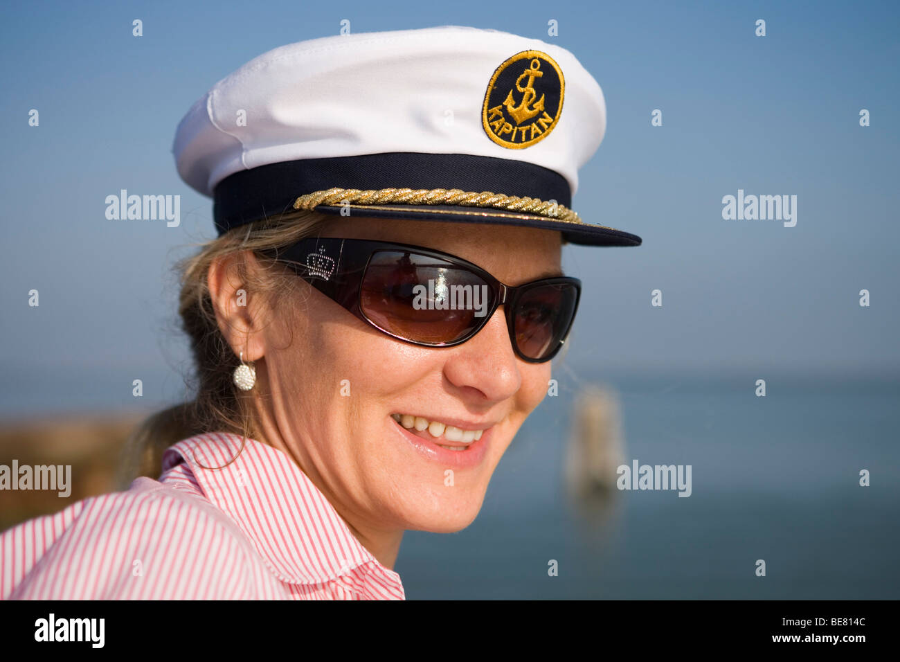 Woman with captains hat on board the houseboat, Le Boat Magnifique Stock  Photo - Alamy