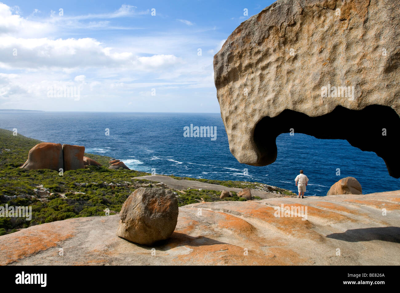 A man standing amidst the Remarkable Rocks at Flinders Chase National ...