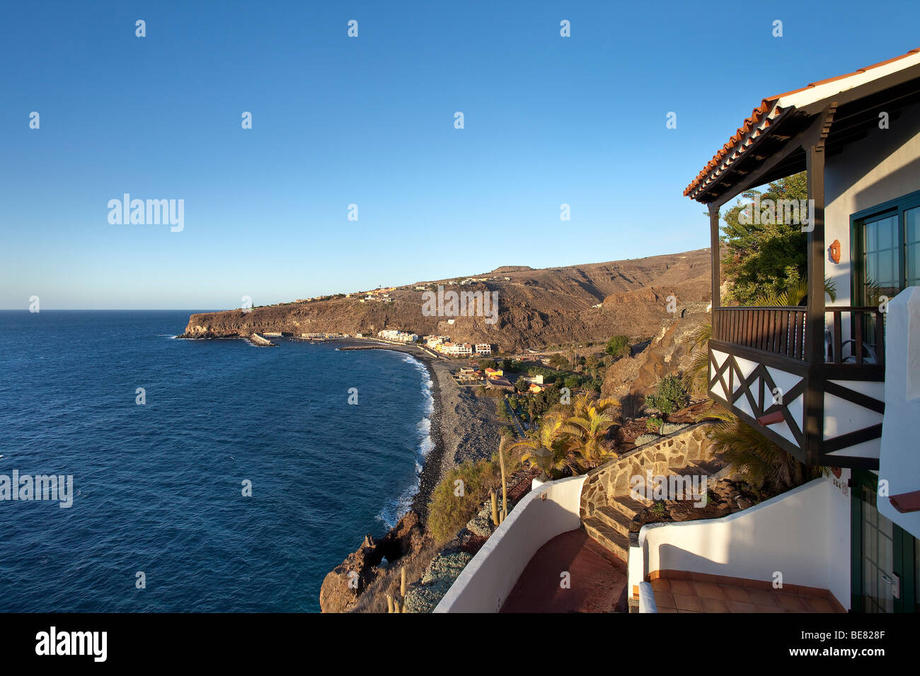 View from Jardin Tecina Hotel at coastline under blue sky, Playa de Santiago, La Gomera, Canary Islands, Spain, Europe Stock Photo