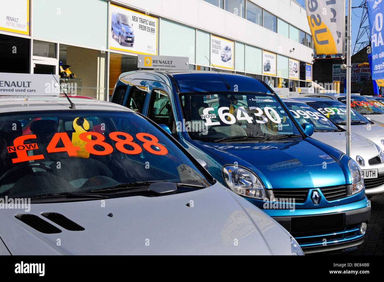 East London Renault car dealer forecourt display of cars with large price labels Stock Photo