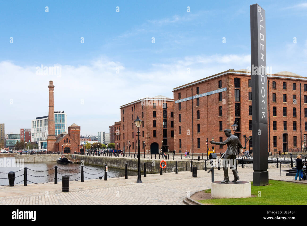 Albert Dock with the Merseyside Maritime Museum to the right and statue of Billy Fury in foreground, Liverpool, Merseyside Stock Photo