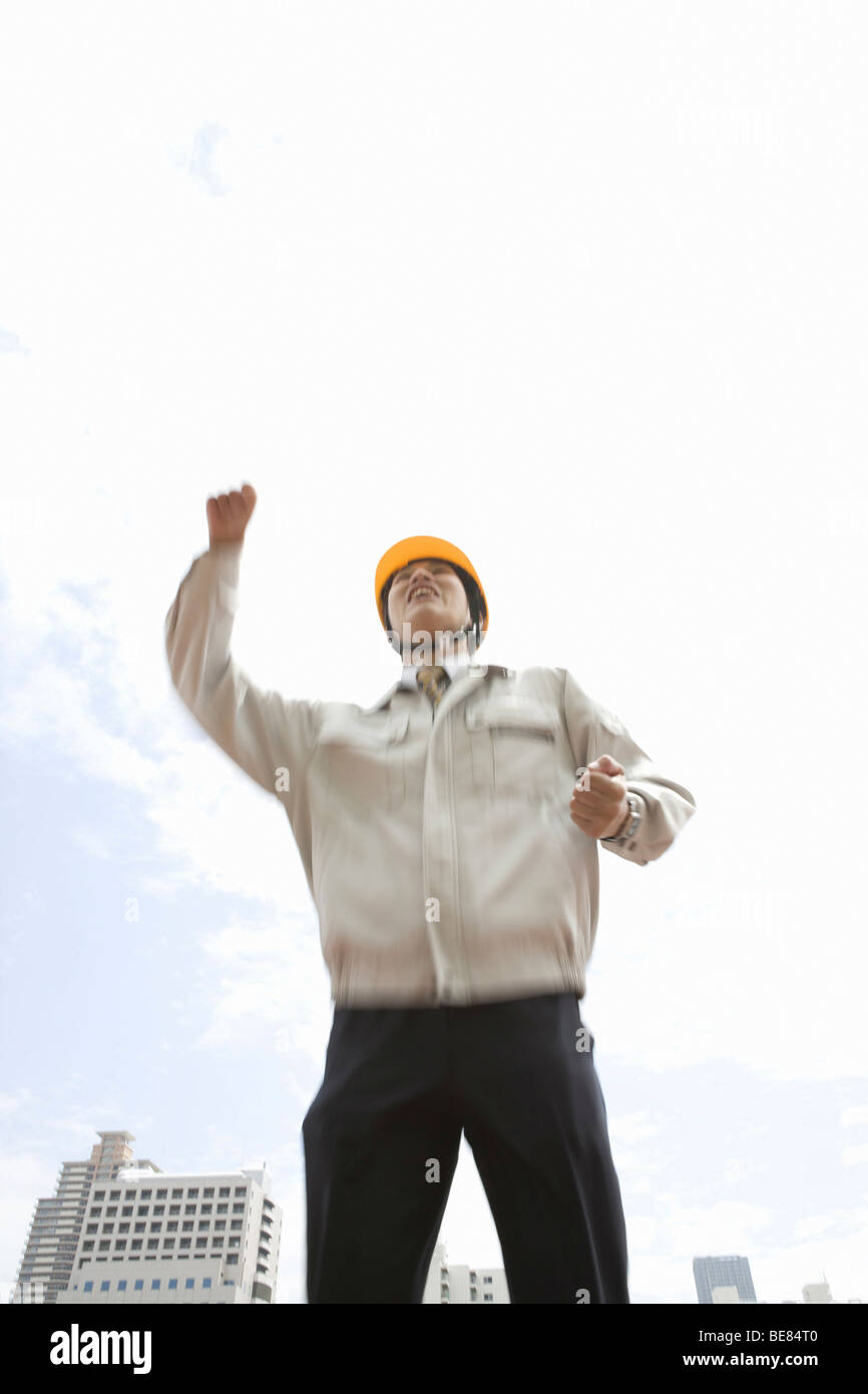 Workman Cheering Business man cheering city hi-res stock photography and images - Alamy