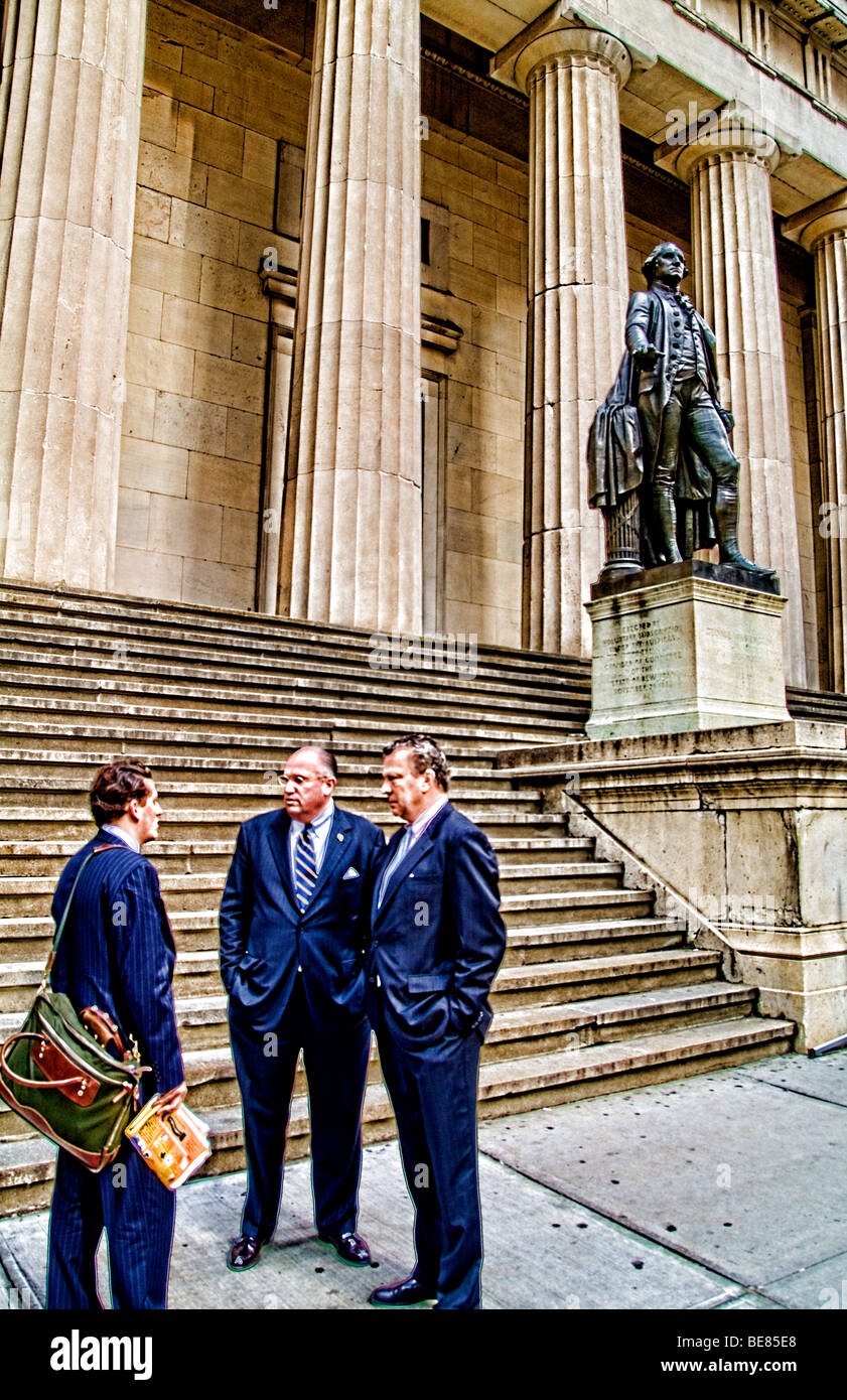 Businessmen in front of famous George Washington statue at Federal Hall ...