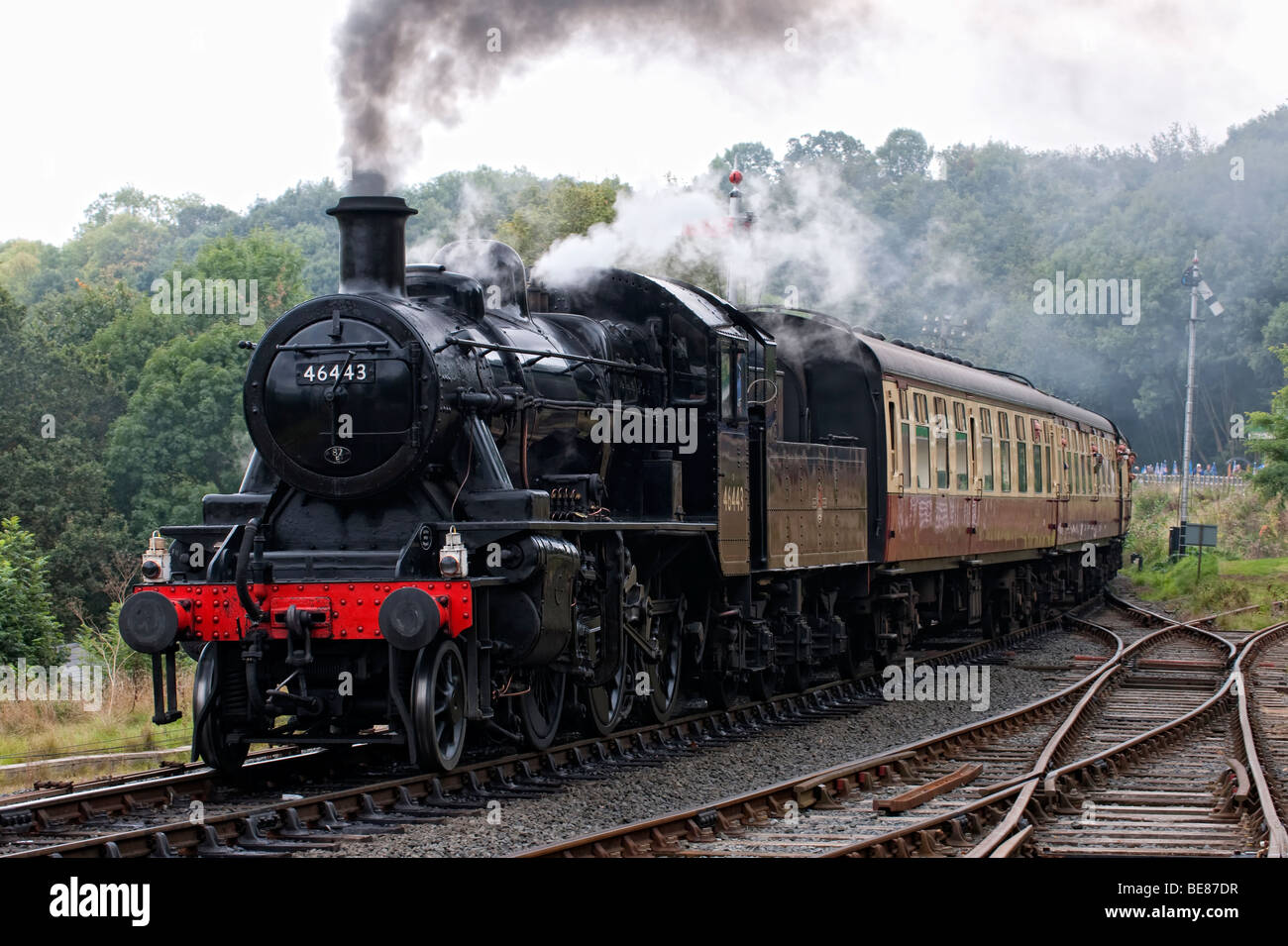 Steam locomotive approaching Highley Station on the Severn Valley Railway Stock Photo