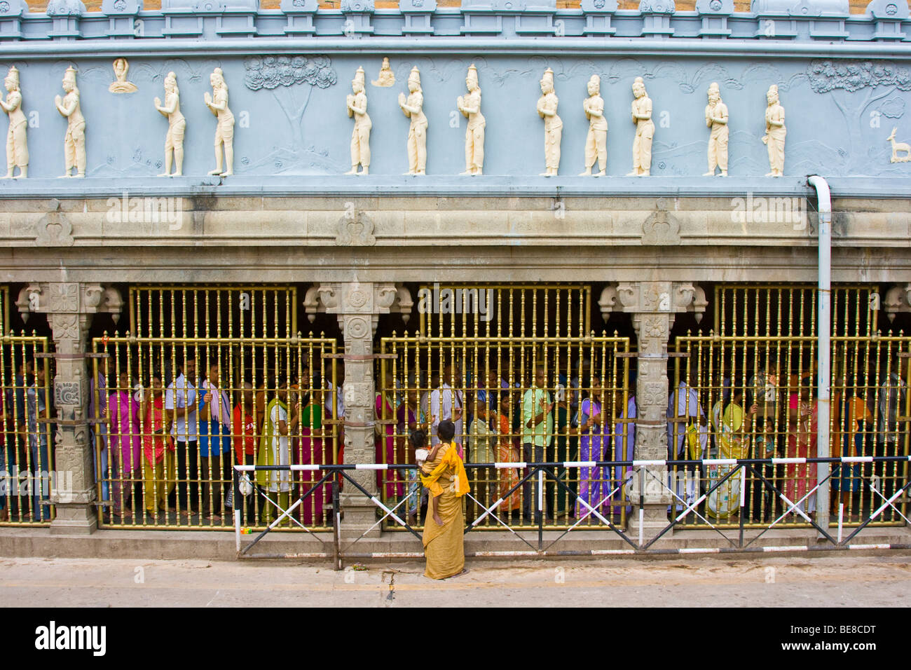 Hindu pilgrims waiting for hours in line to see the idol at Sri Venkateswara Temple in Tirupati India Stock Photo