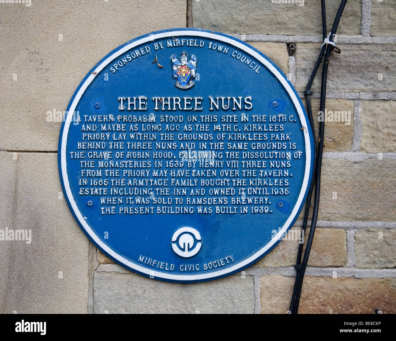 Blue information plaque outside the Three Nuns Inn at Cooper Bridge, Mirfield, West Yorkshire UK Stock Photo