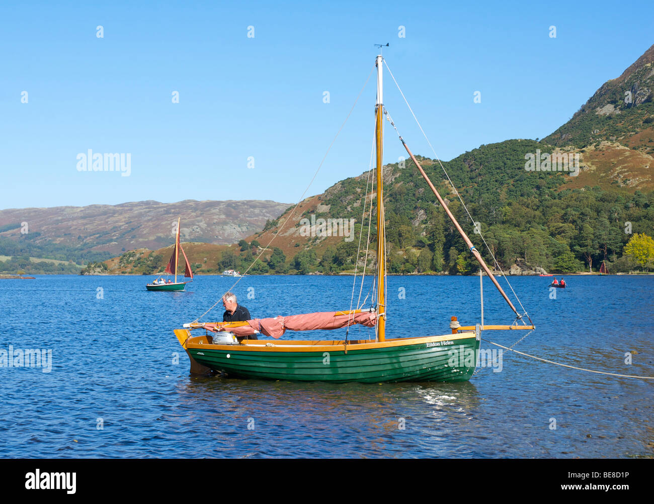 Man launching sailing boat, Glenridding Sailing Club, Ullswater, Lake