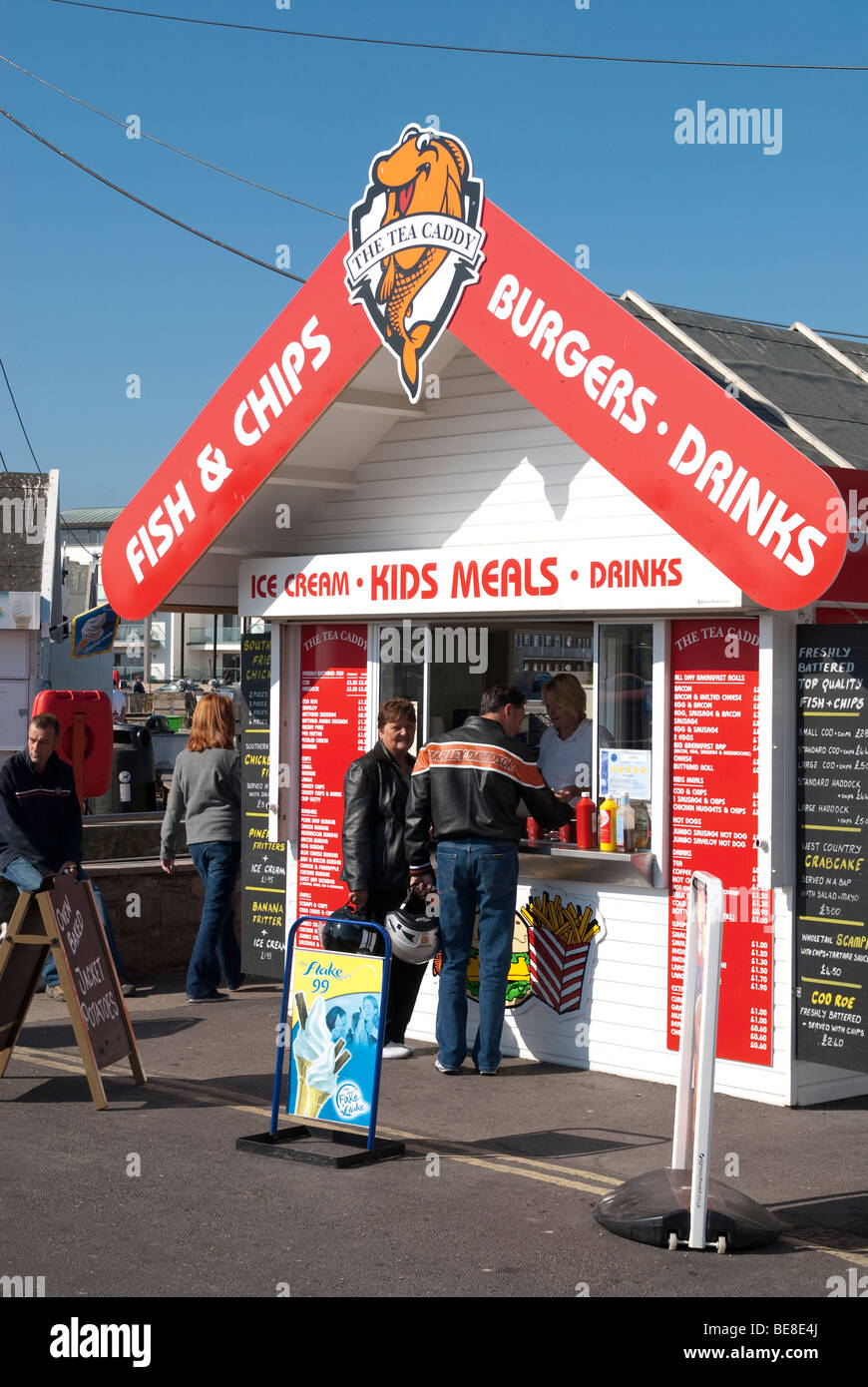 Fish and chips and fast food huts on the quayside at West Bay Dorset Stock Photo Alamy