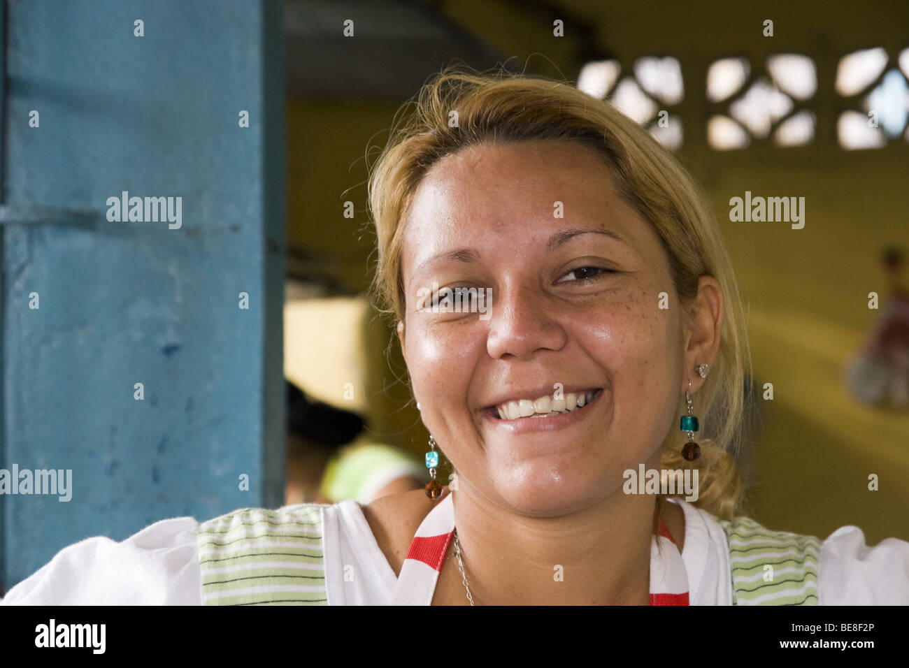 A Panamanian woman smiles for the camera. San Miguelito, Panama City, Republic of Panama, Central America Stock Photo