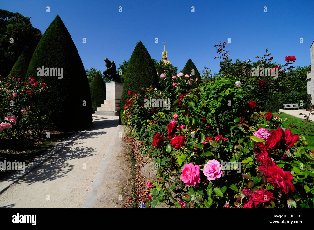 Rodin's famous sculpture "The Thinker" in the rose garden at the Musée