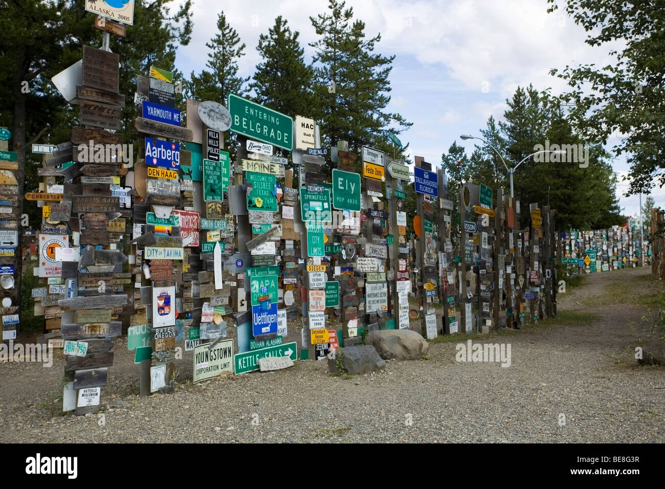 Famous Alaska Highway Sign Post Forrest in Watson Lake, Yukon Territory, Canada Stock Photo
