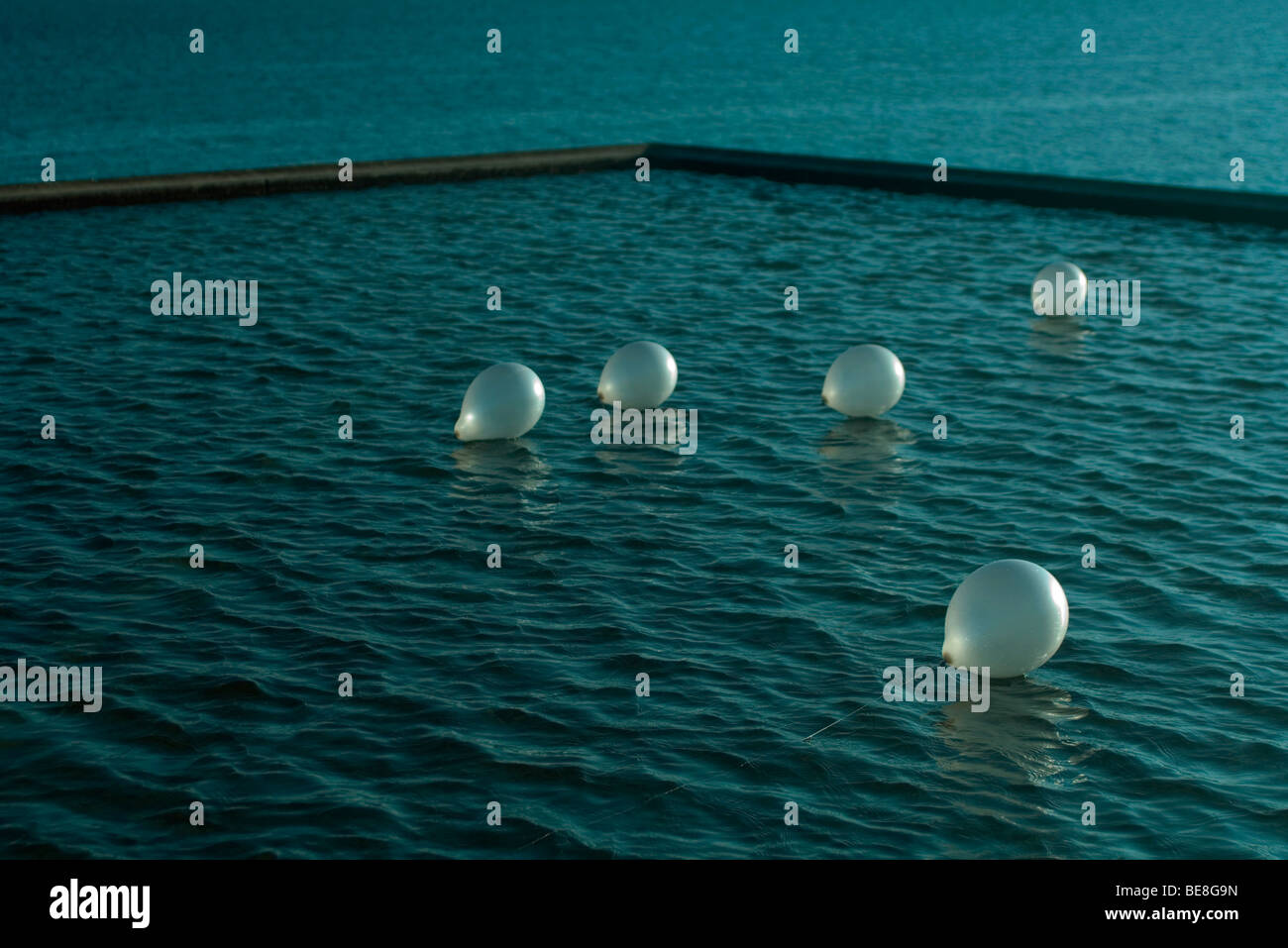 Balloons floating on water Stock Photo Alamy