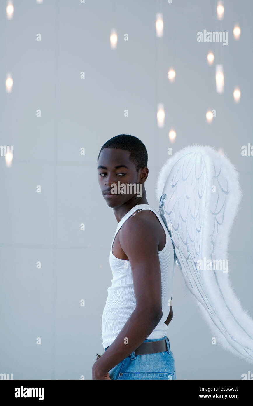 Male wearing angel wings looking hires stock photography and images
