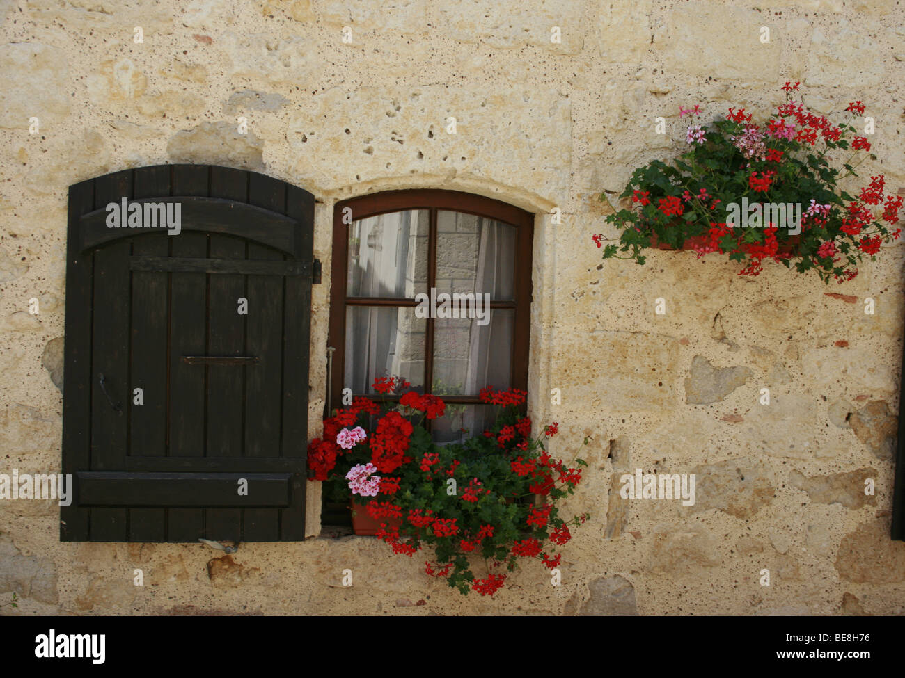 Window and shutter in the village of Blaziert, France Stock Photo