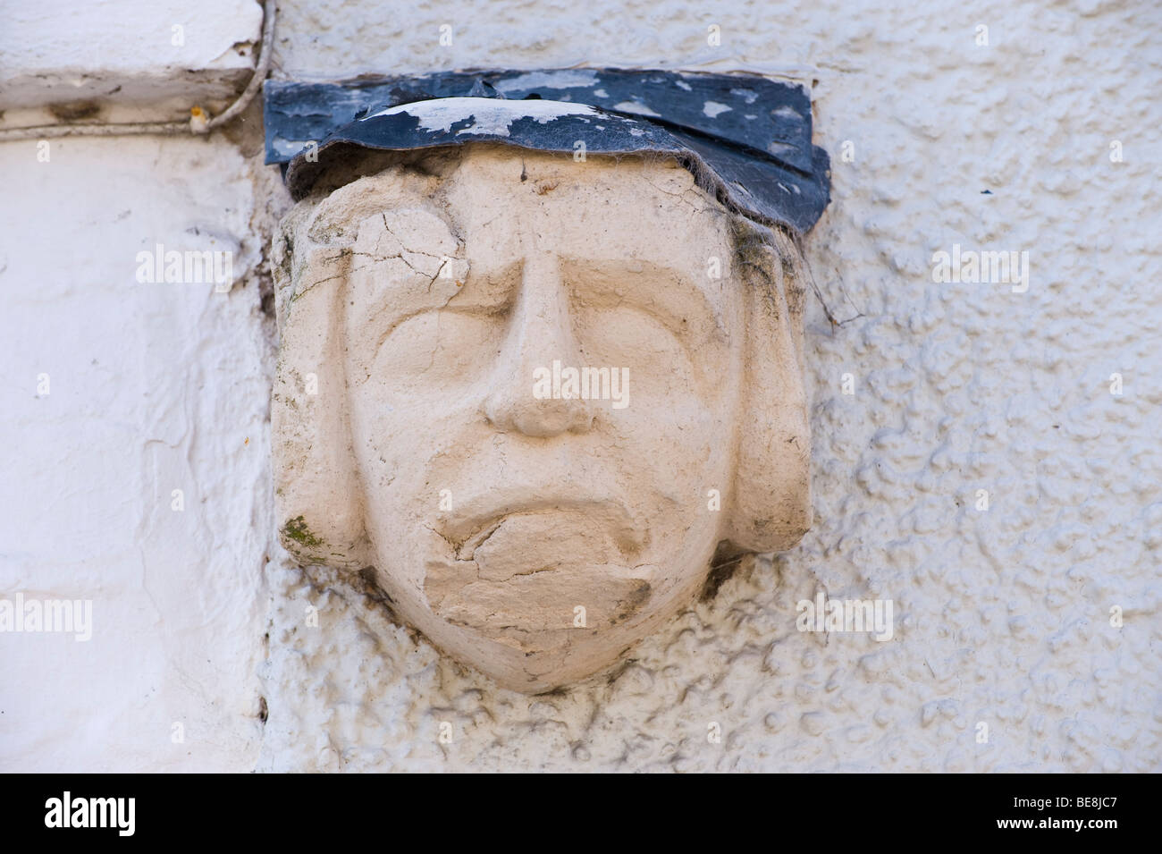 Small stone carved head on exterior wall of house Ludlow Shropshire England UK Stock Photo Alamy