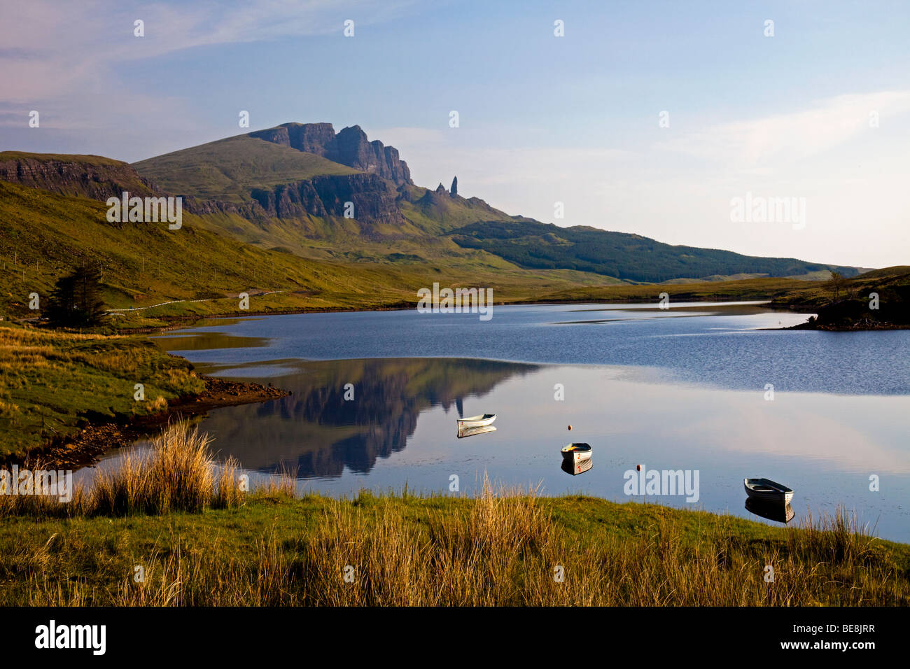 Rowing boats on Loch Fada with Old Man of Storr in background Isle of Skye, Inner Hebrides, Scotland, UK, Europe Stock Photo
