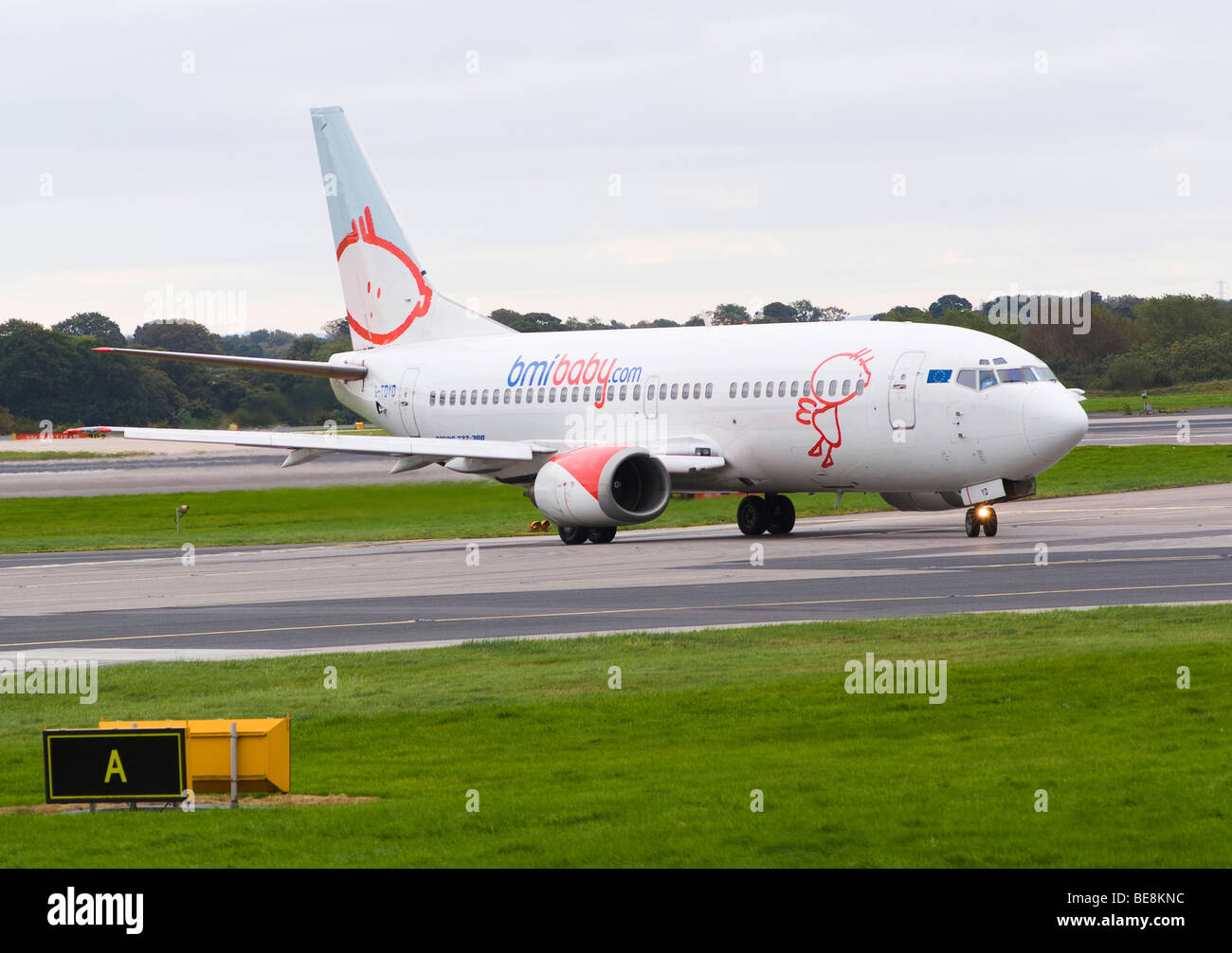 BMI Baby Airline Boeing 737-3QB Airliner G-TOYD Taxiing After Landing at Manchester Ringway Airport England United Kingdom UK Stock Photo