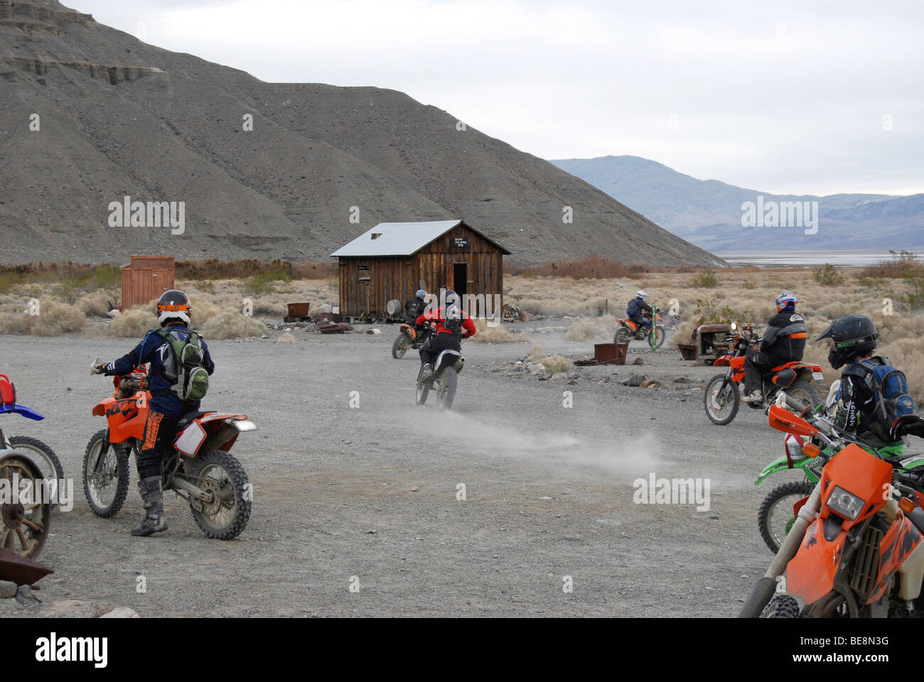 dirt bike riders having fun in the ghost town of ballarat in death valley  california Stock Photo - Alamy