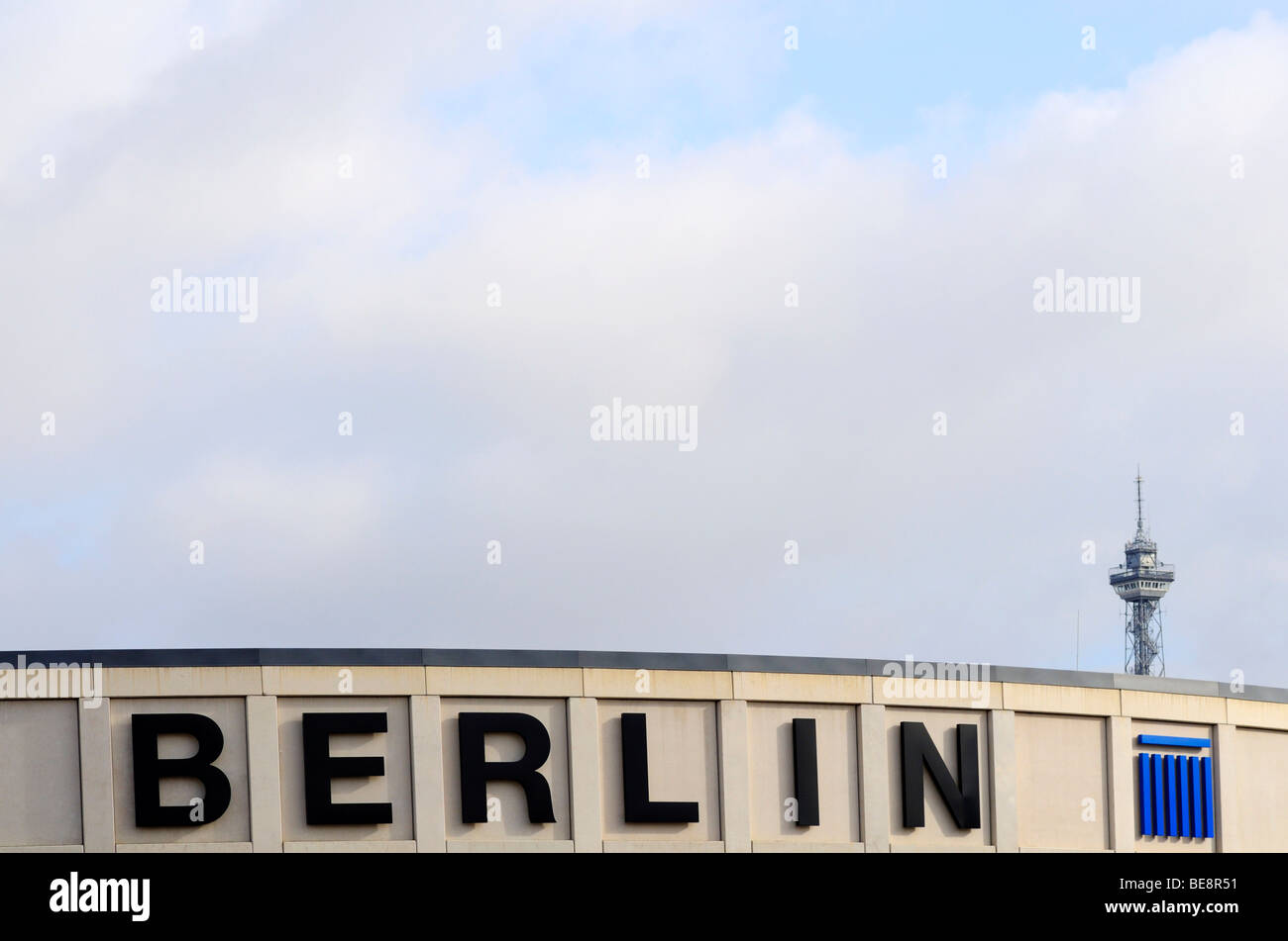 Messe Berlin fairgrounds, writing above the main entrance, radio tower Berlin, Berliner Funkturm, right, Berlin, Germany, Europe Stock Photo