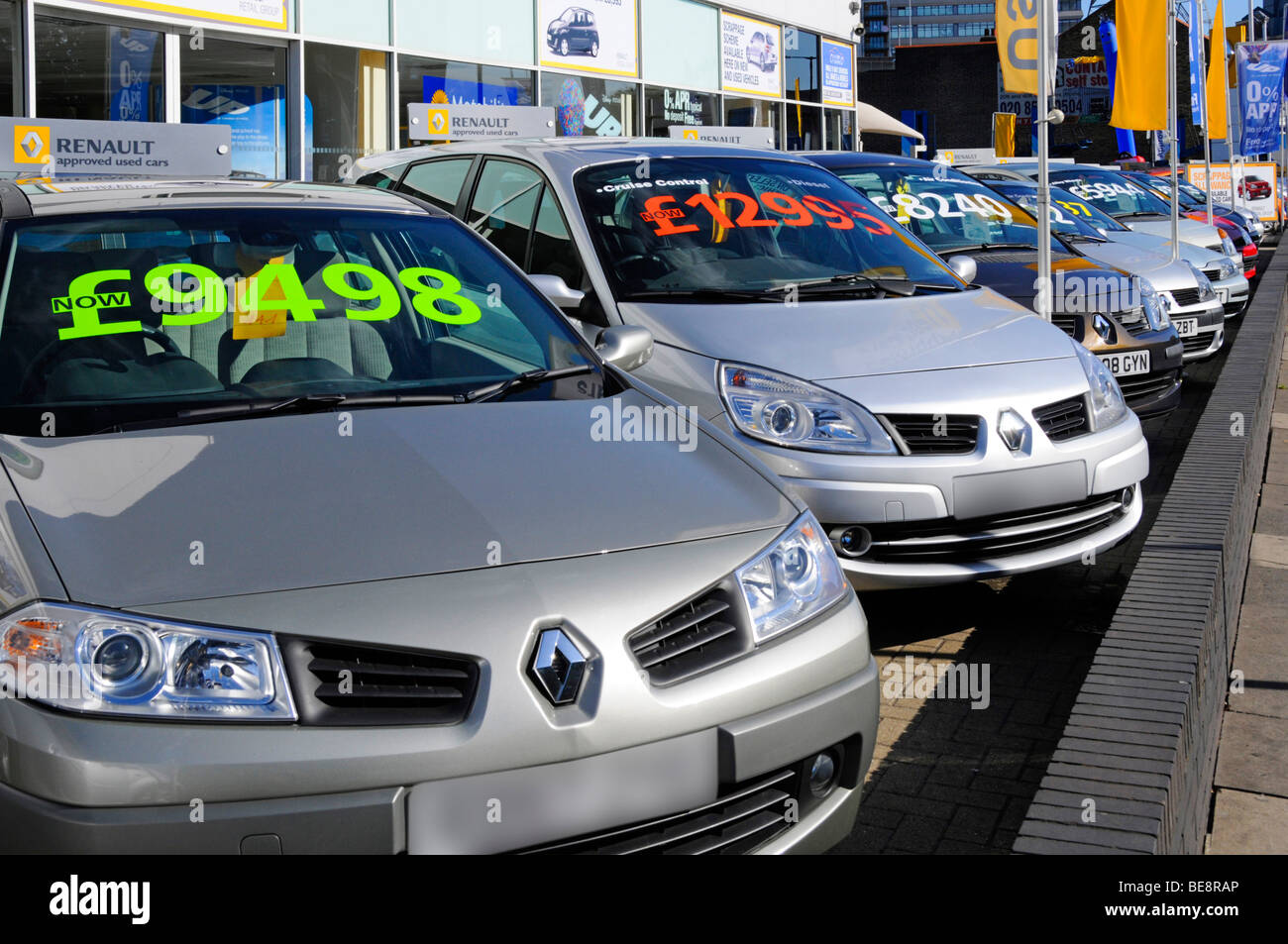 East London Renault car dealer forecourt display of cars with large
