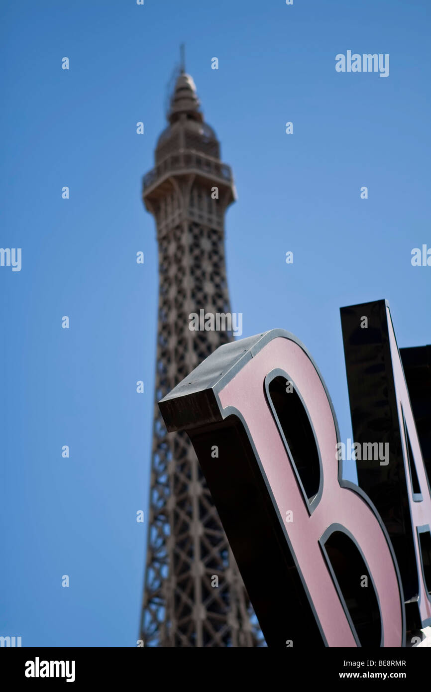 Logo of the Ballys Hotel, Eiffel Tower of the Paris Hotel in the back, in Las Vegas, Nevada, USA Stock Photo