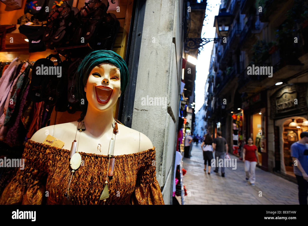 mannequin outside clothes shop along narrow Carrer de Boria. Barri Gotic. Barcelona. Spain Stock Photo