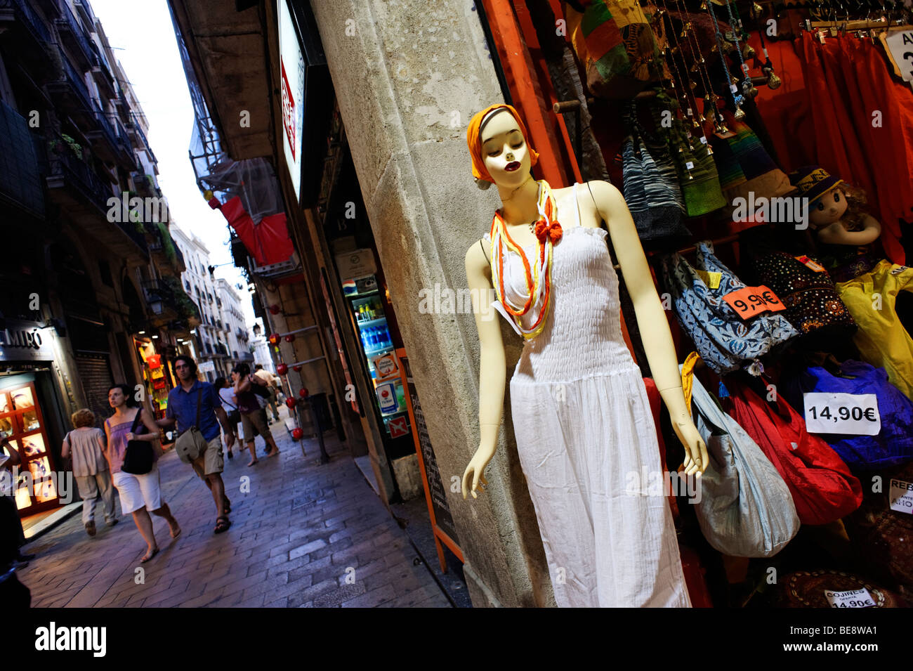 mannequin outside clothes shop along narrow Carrer de Boria. Barri Gotic. Barcelona. Spain Stock Photo