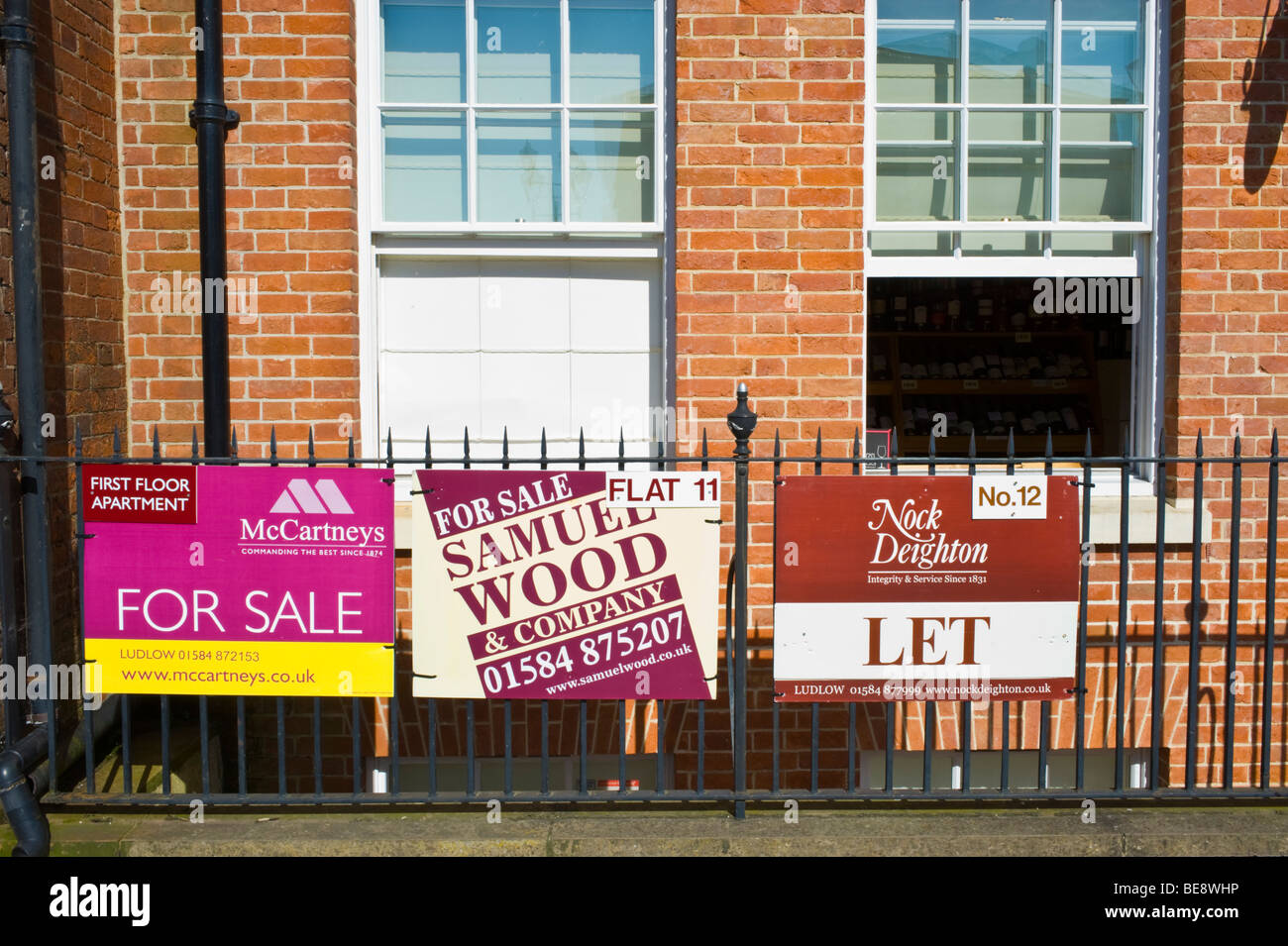 Flats with estate agents boards outside for sale and to let in Ludlow Shropshire England UK Stock Photo