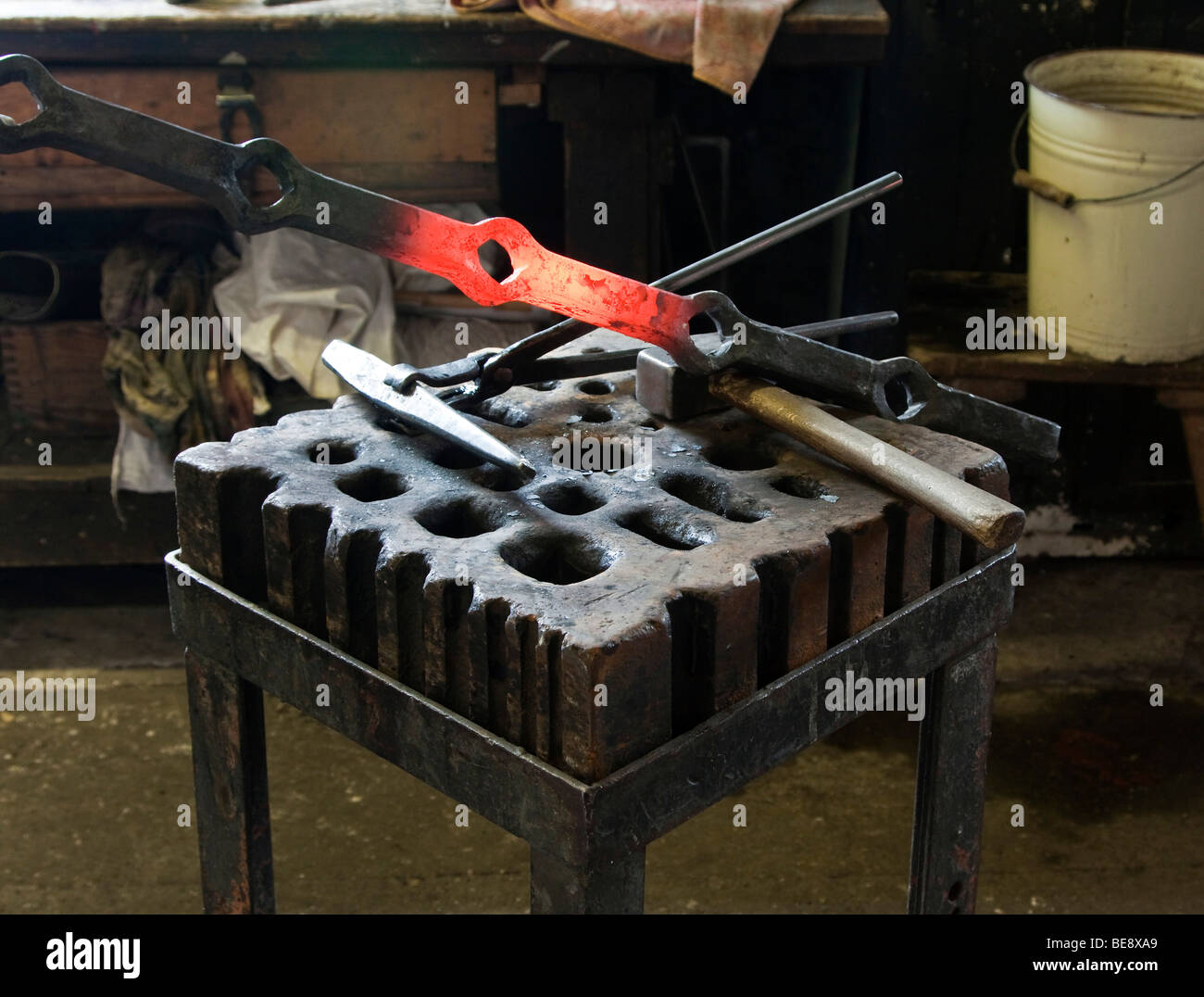 Glowing workpiece on the workbench in a forge, Berlin, Germany Stock Photo