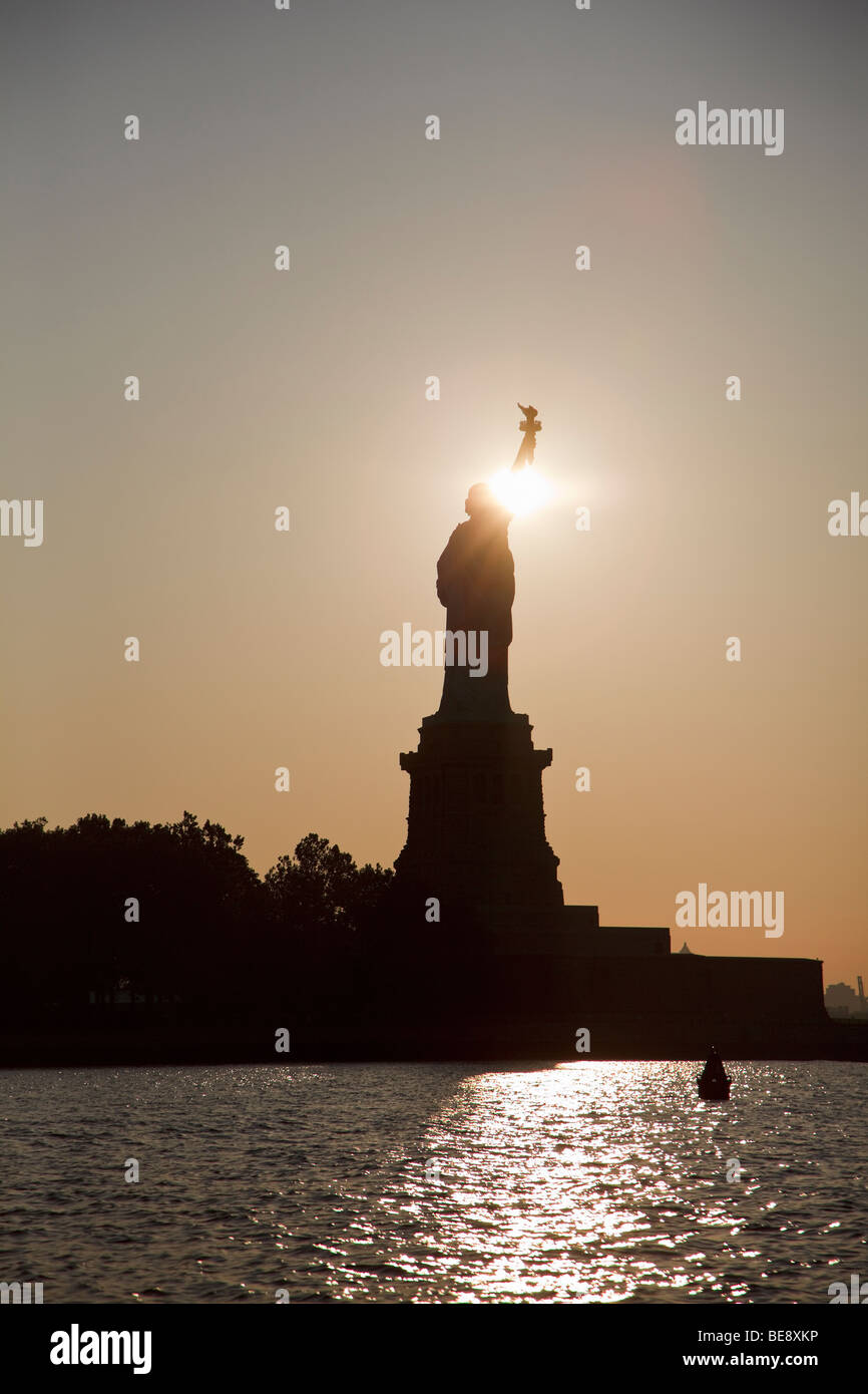 Statue of Liberty at sunrise Stock Photo