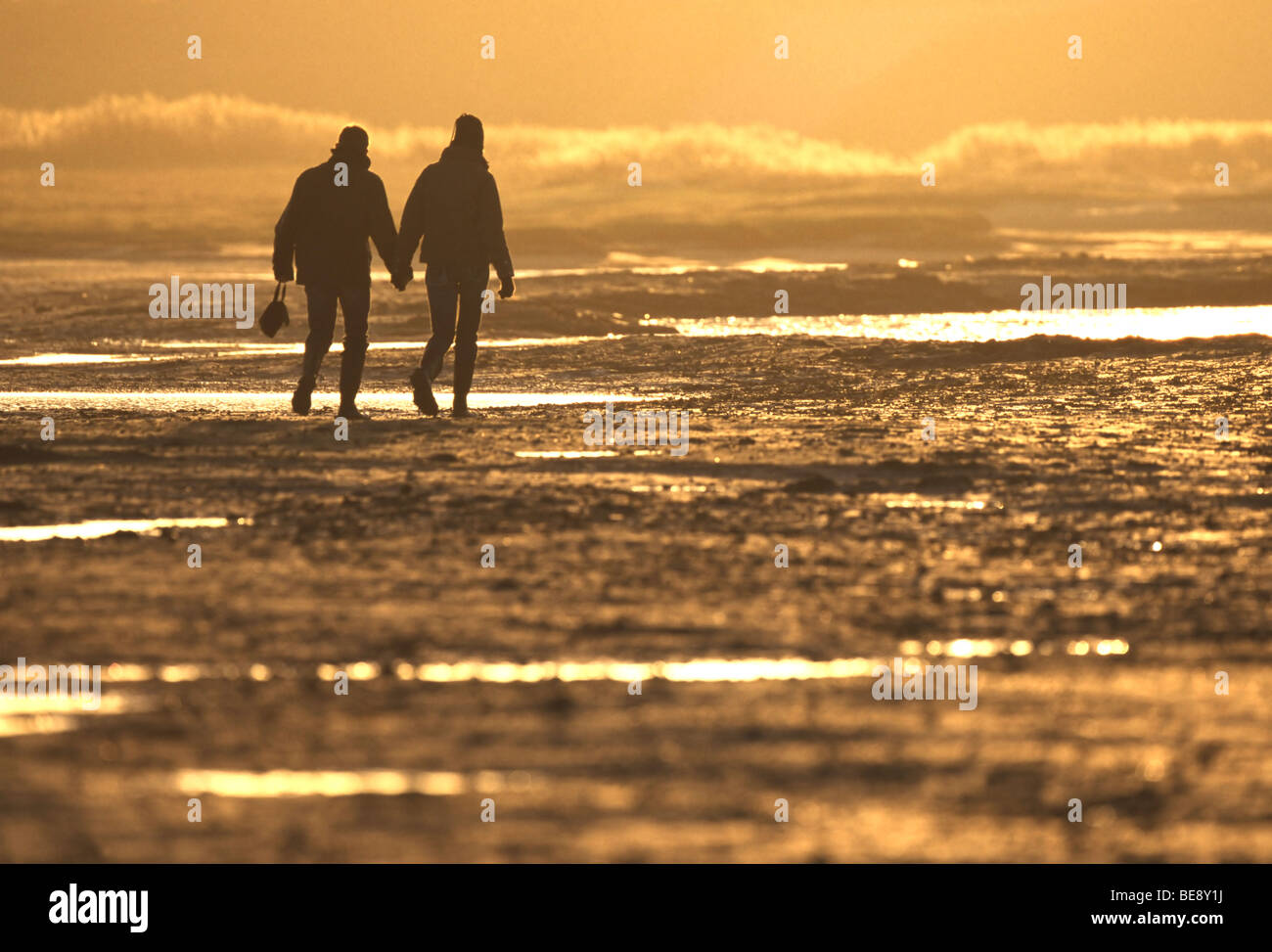 Walking on the beach Stock Photo