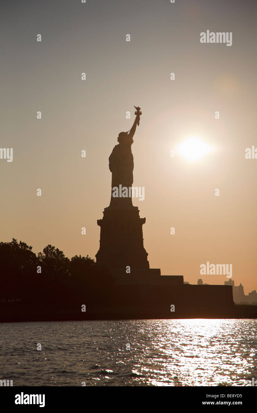 Statue of Liberty at sunrise Stock Photo