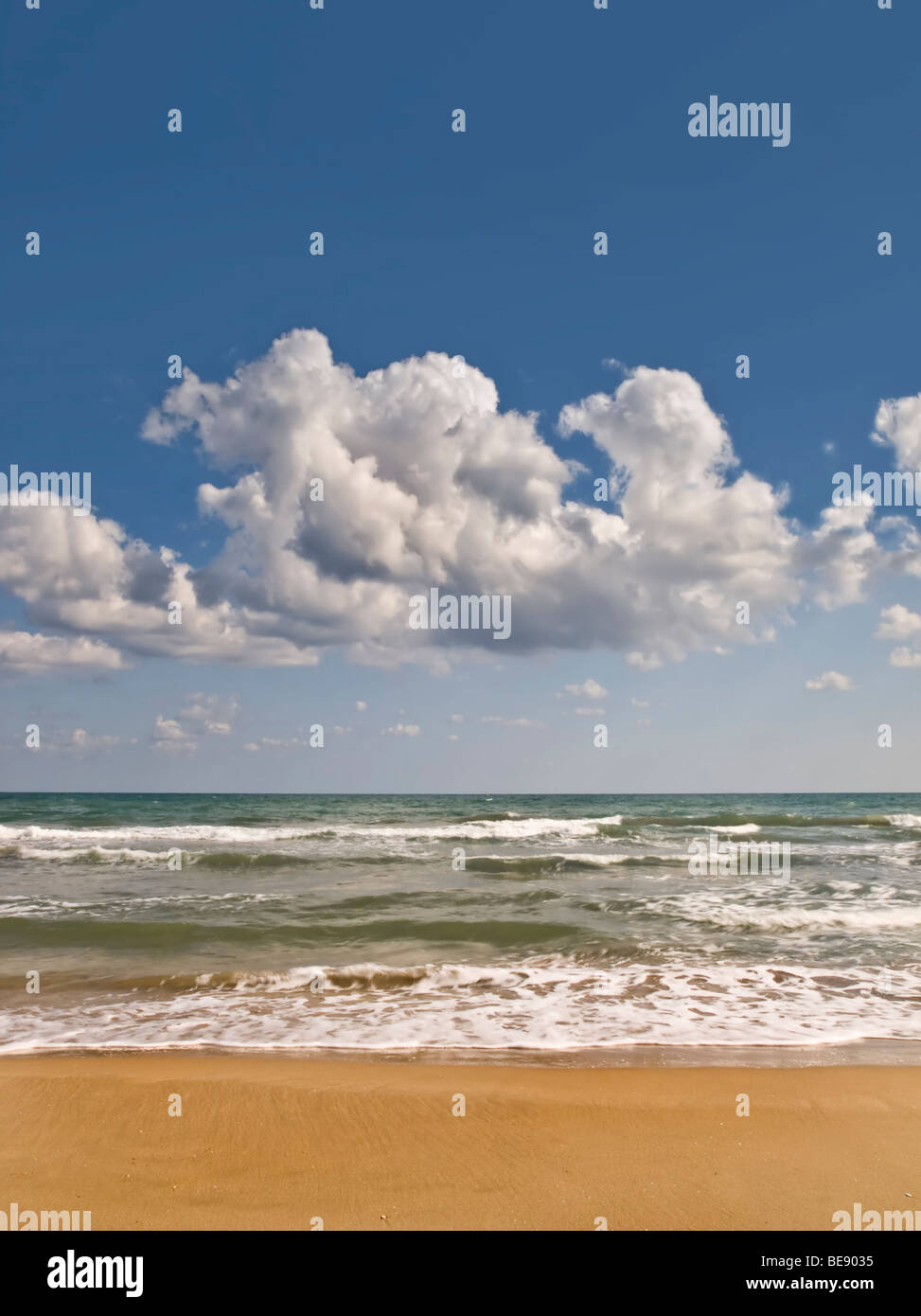 Seascape taken in a beautiful beach in summer. Slight movement captured in the waves Stock Photo