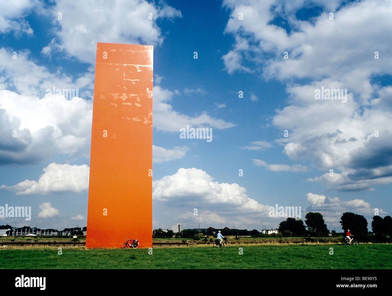 Landmark Rheinorange, Rhine Orange by Lutz Frisch, monumental orange stele at the mouth of the Ruhr river, Duisburg-Ruhrort, Ru Stock Photo